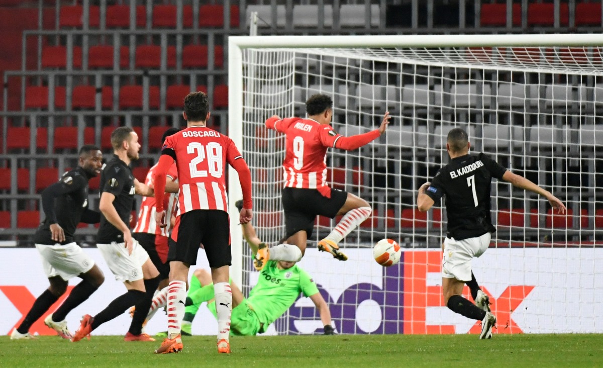 Soccer Football - Europa League - Group E - PSV Eindhoven v PAOK - Philips Stadion, Eindhoven, Netherlands - November 26, 2020 PSV Eindhoven's Donyell Malen scores their third goal REUTERS