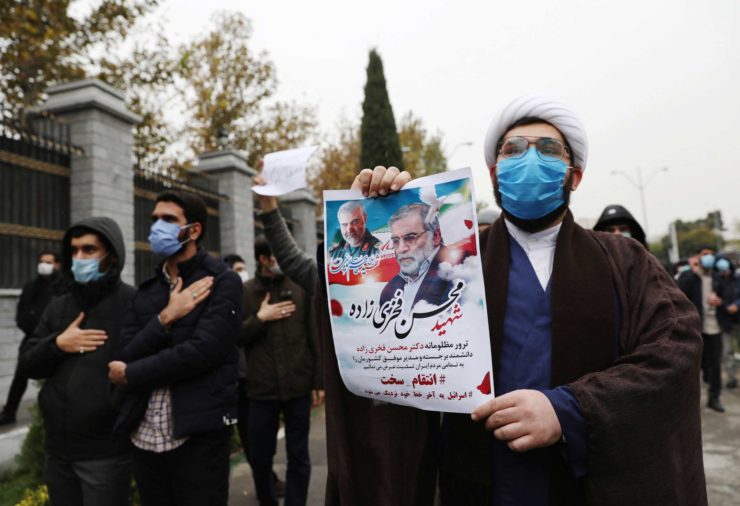 Protesters gather during a demonstration against the killing of Mohsen Fakhrizadeh, Iran's top nuclear scientist, in Tehran, Iran, November 28, 2020. Majid Asgaripour