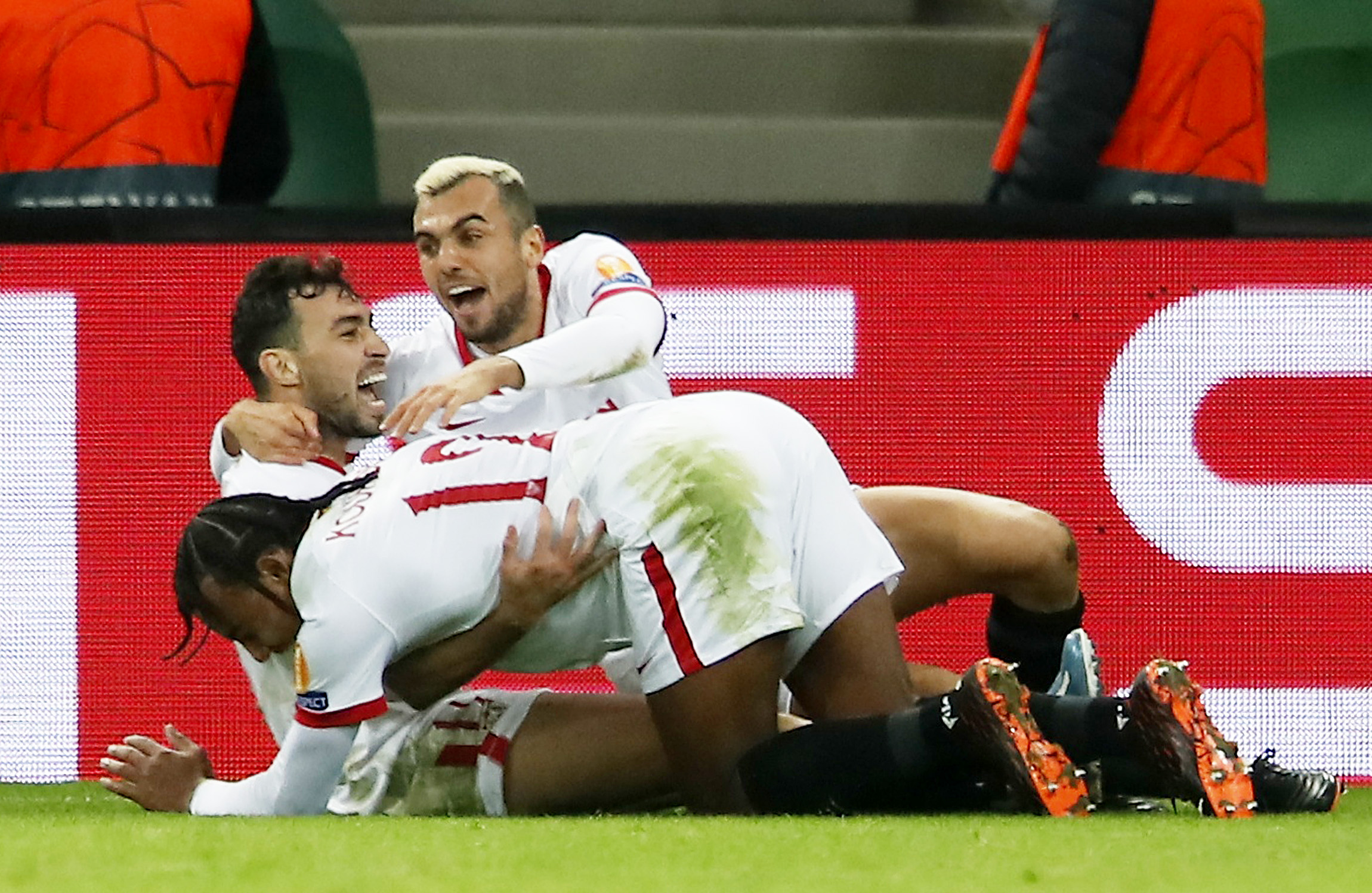 Soccer Football - Champions League - Group E - FC Krasnodar v Sevilla - Krasnodar Stadium, Krasnodar, Russia - November 24, 2020 Sevilla's Munir El Haddadi celebrates scoring their second goal with teammates REUTERS