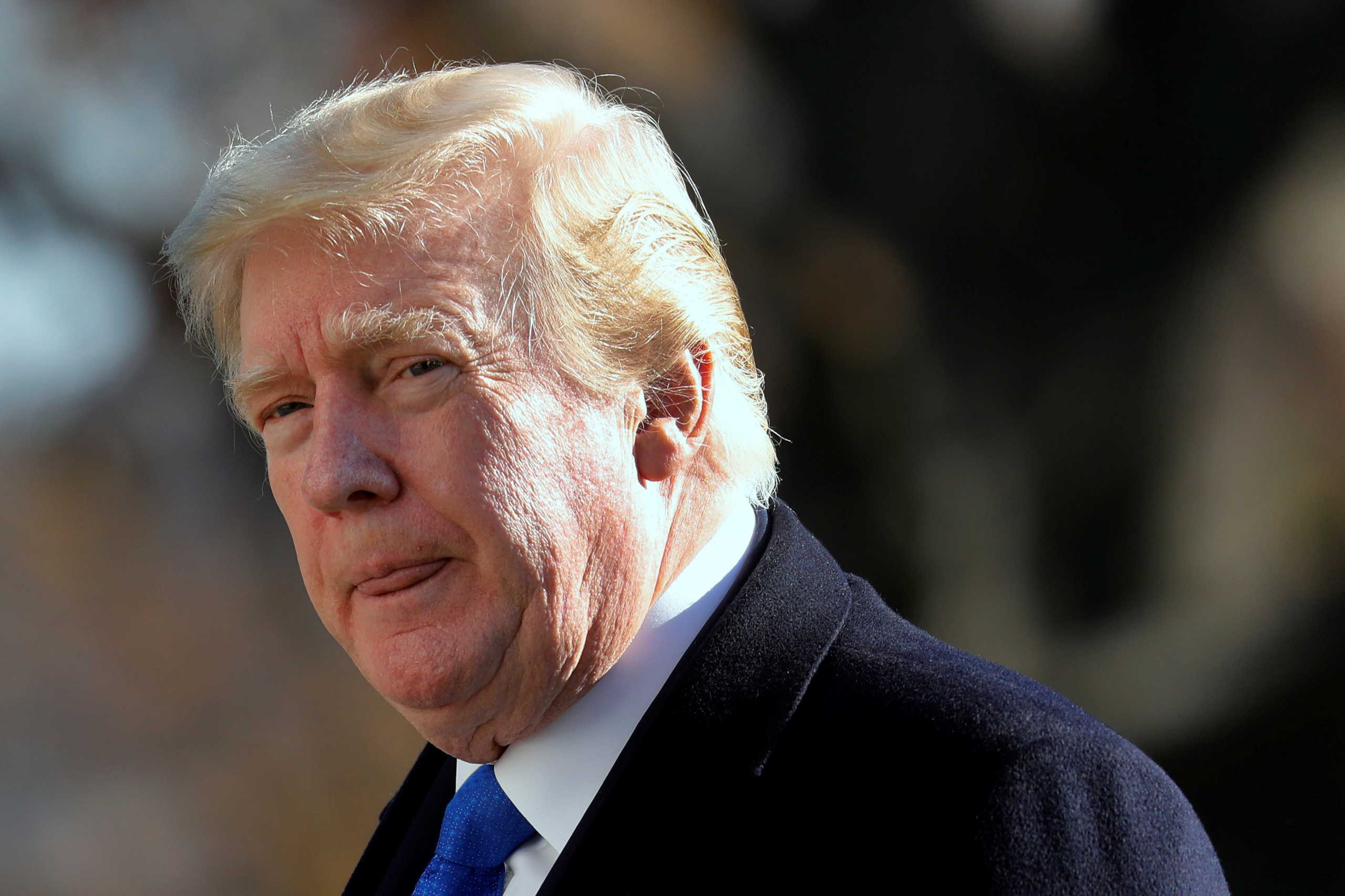 U.S. President Donald Trump walks on the South Lawn of the White House upon his return to Washington from Camp David, U.S., November 29, 2020. REUTERS