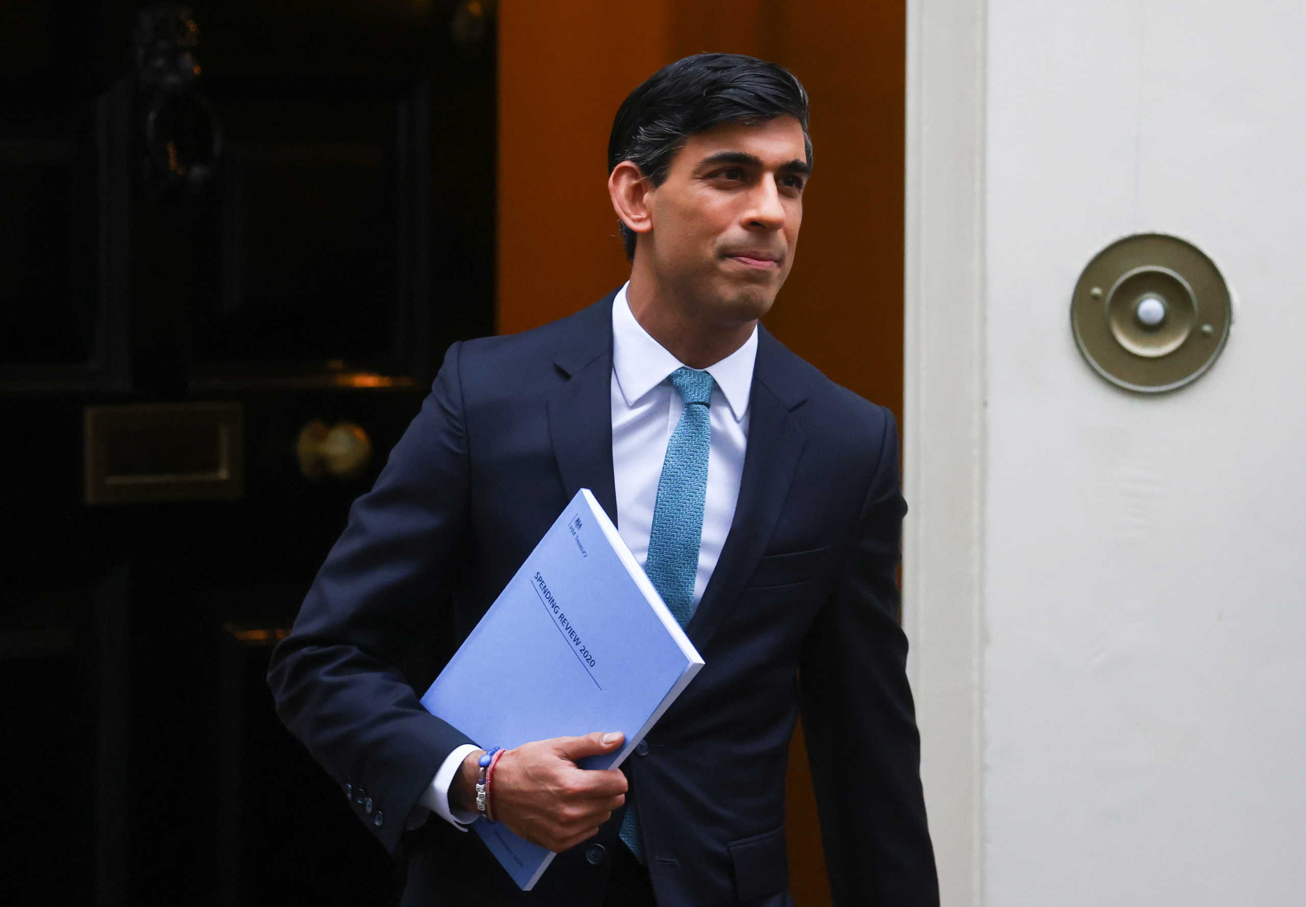 Britain's Chancellor of the Exchequer Rishi Sunak leaves Downing Street, in London, Britain, November 25, 2020. REUTERS