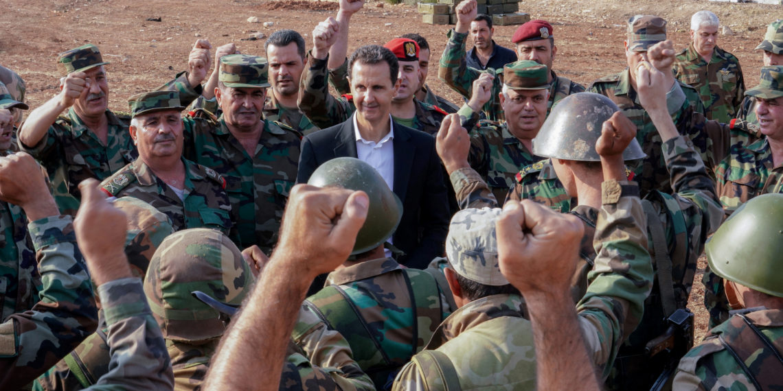 Syrian President Bashar al Assad visits Syrian army troops in war-torn northwestern Idlib province, Syria, in this handout released by SANA on October 22, 2019. SANA
