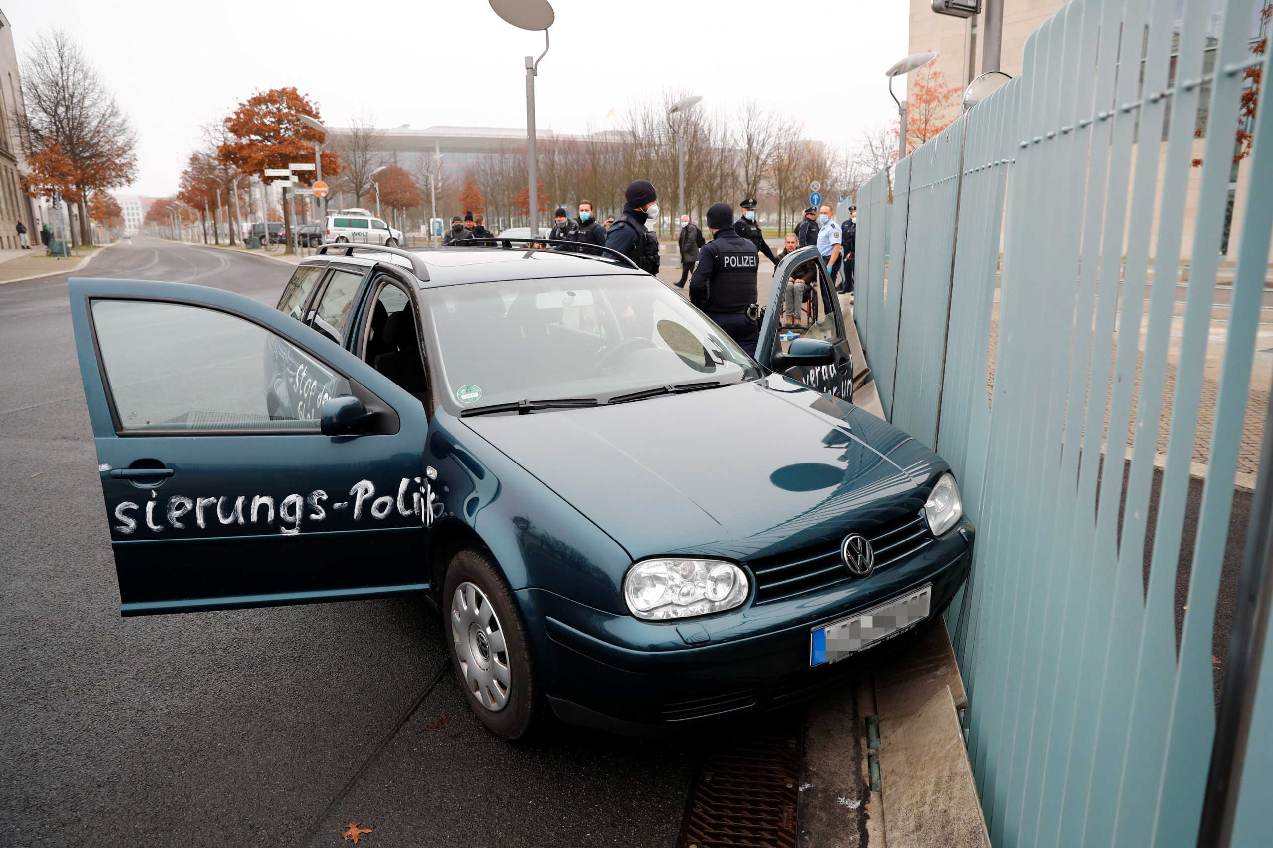 A car crash into the gate of the office of German Chancellor Angela Merkel in Berlin, Germany, November 25, 2020. REUTERS