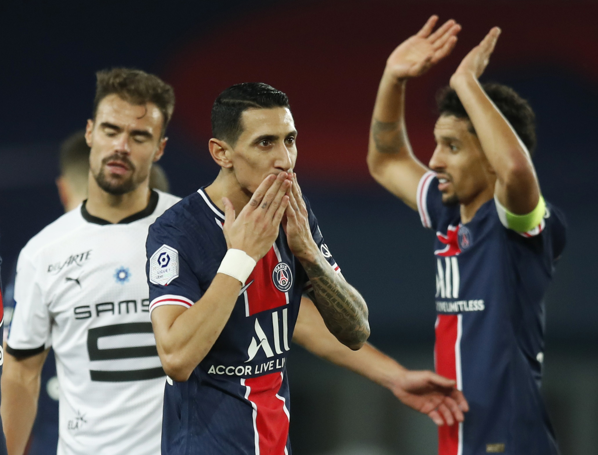 Soccer Football - Ligue 1 - Paris St Germain v Stade Rennes - Parc des Princes, Paris, France - November 7, 2020 Paris St Germain's Angel Di Maria celebrates scoring their third goal  with teammates REUTERS