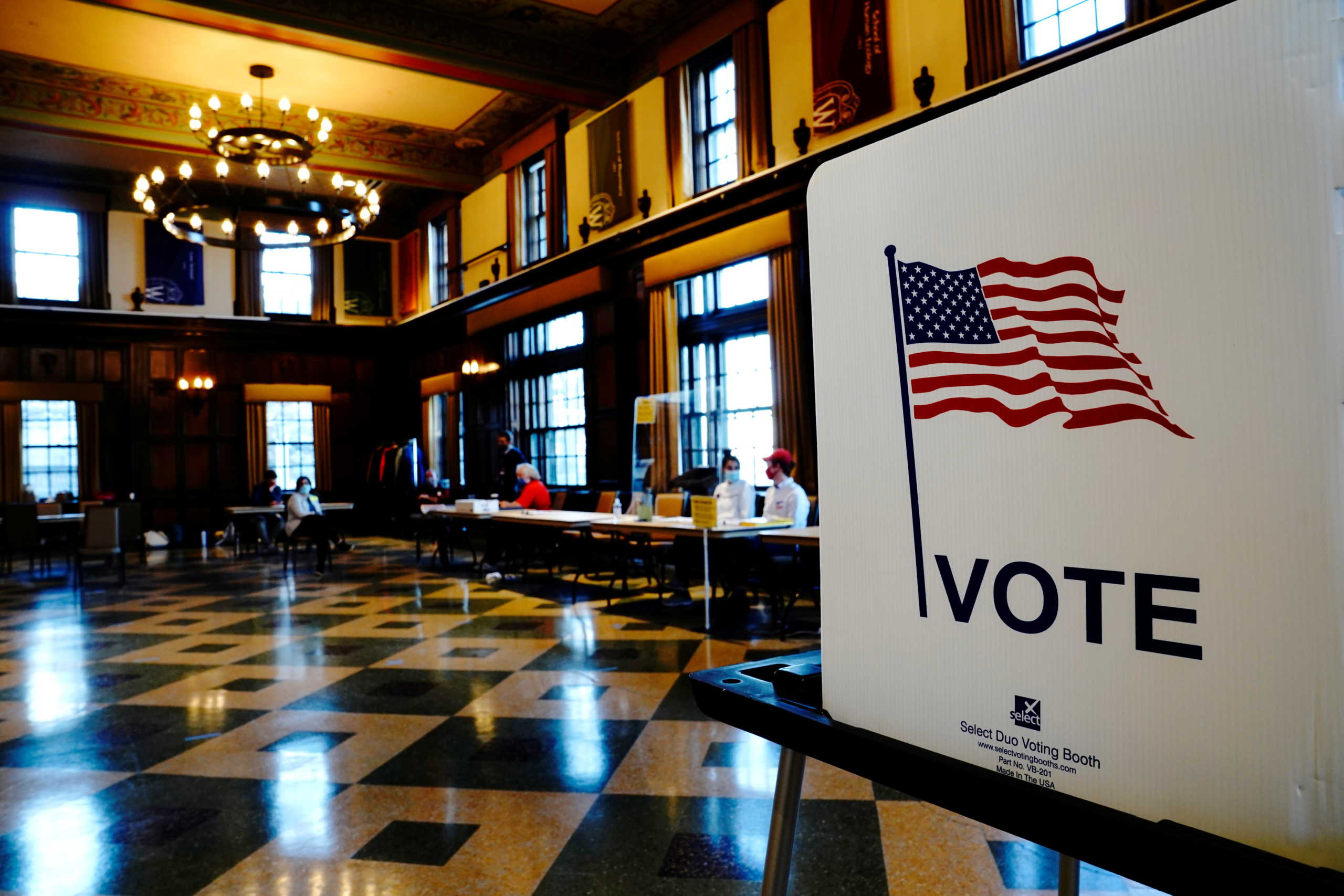 A privacy booth is seen as poll workers wait for voters at a voting site in Tripp Commons inside the Memorial Union building on the University of Wisconsin-Madison campus on Election Day in Madison, Dane County, Wisconsin, U.S. November 3, 2020. REUTERS