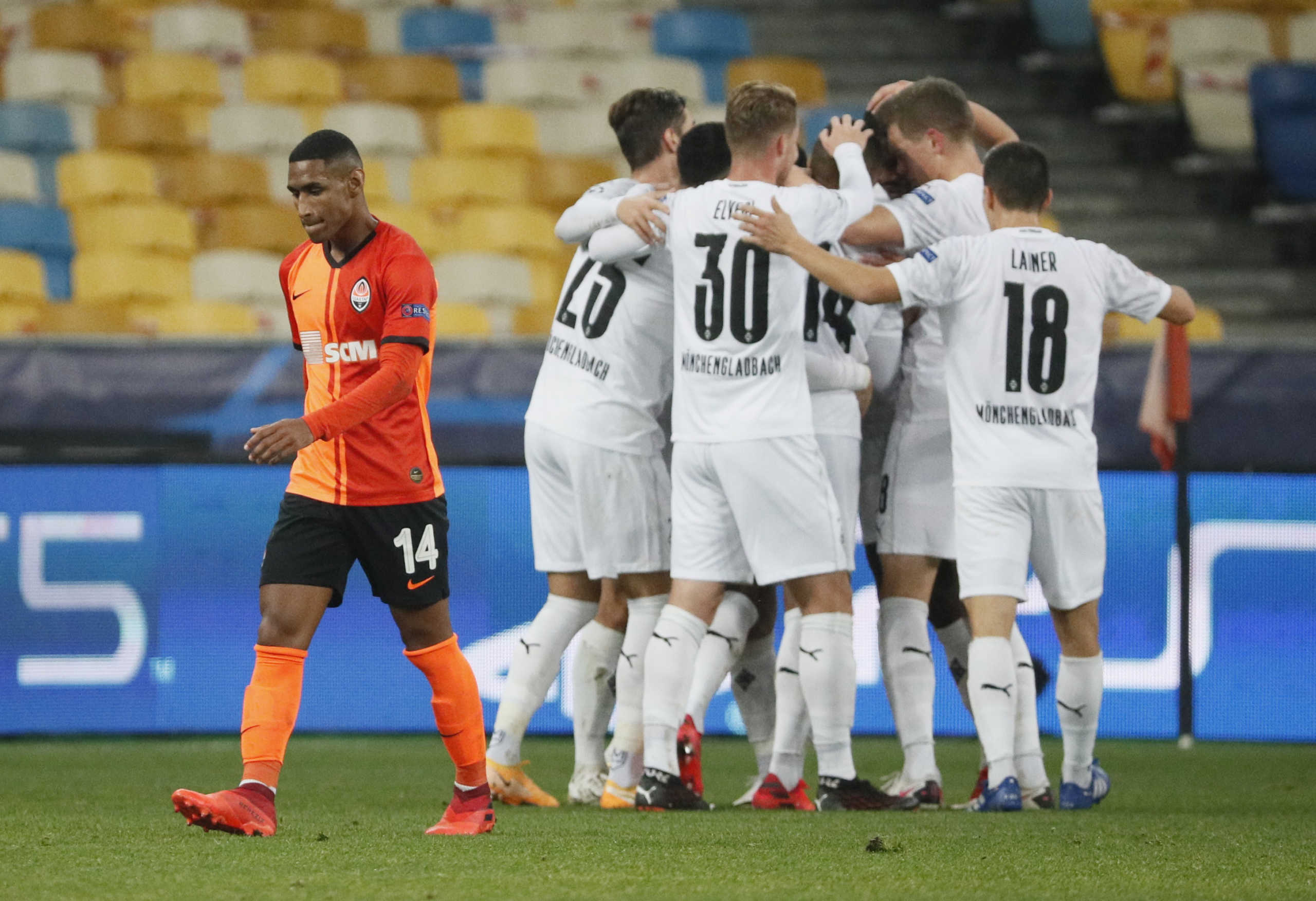 Soccer Football - Champions League - Group B - Shakhtar Donetsk v Borussia Moenchengladbach - NSC Olympiyskiy, Kyiv, Ukraine - November 3, 2020  Borussia Moenchengladbach's Alassane Plea celebrates scoring their third goal with teammates REUTERS