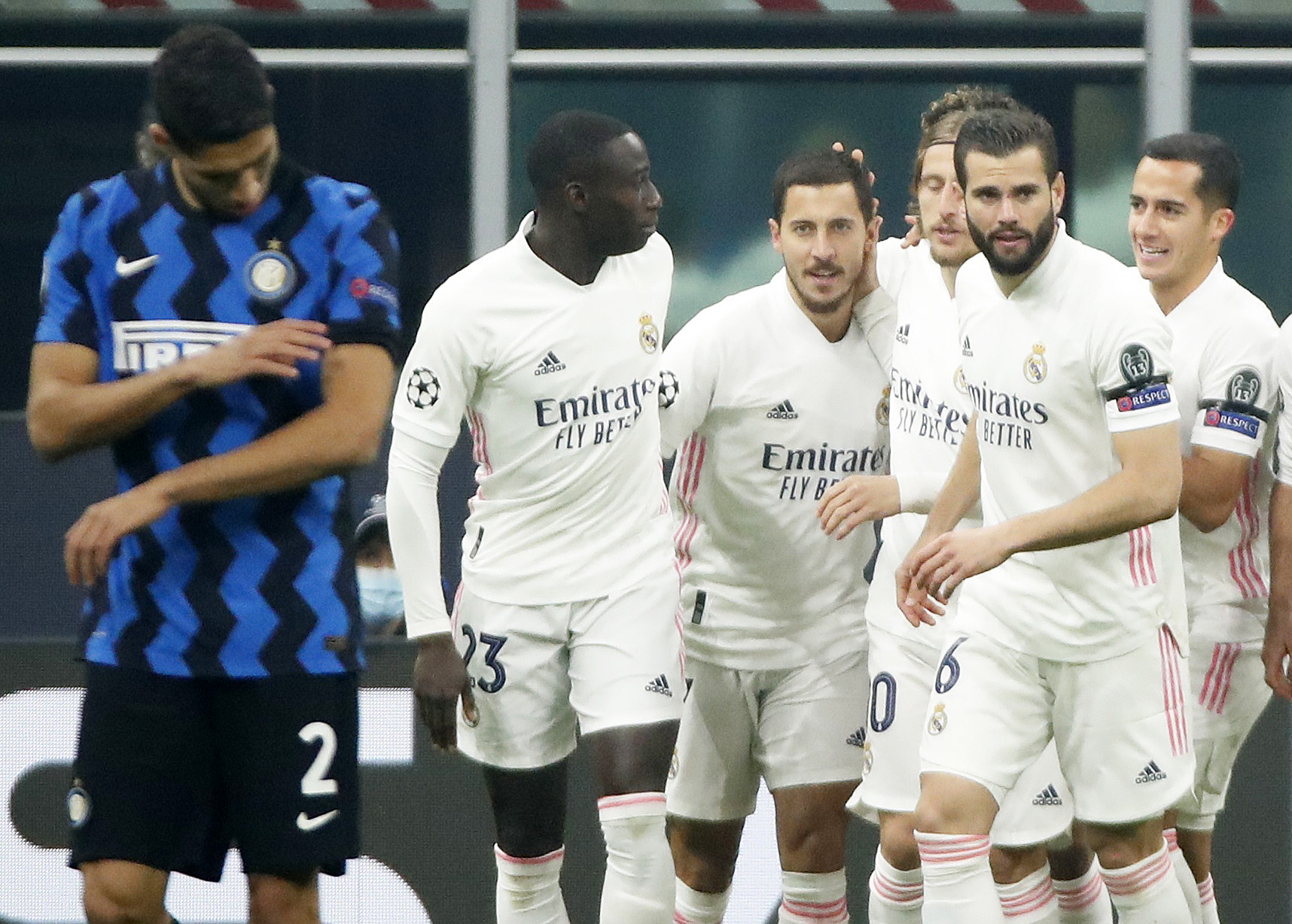 Soccer Football - Champions League - Group B - Inter Milan v Real Madrid - San Siro, Milan, Italy - November 25, 2020 Real Madrid's Eden Hazard celebrates scoring their first goal with teammates REUTERS