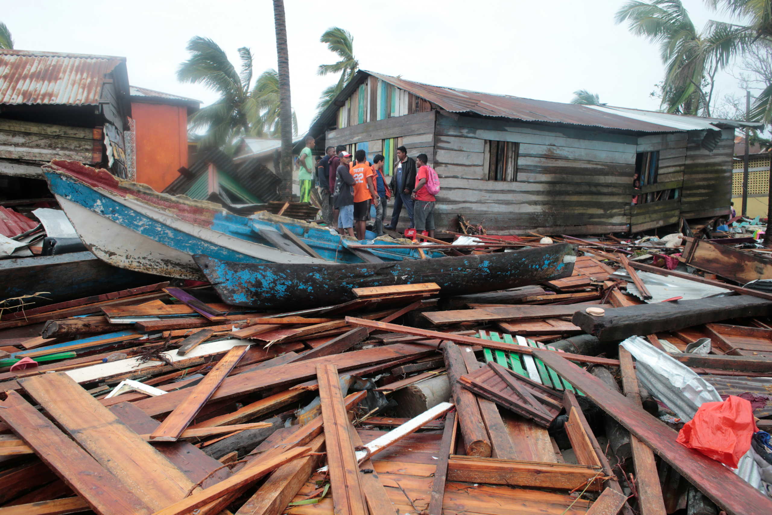 Residents gather near houses destroyed by the passing of Hurricane Iota, in Puerto Cabezas, Nicaragua November 17, 2020. Picture taken November 17, 2020. REUTERS