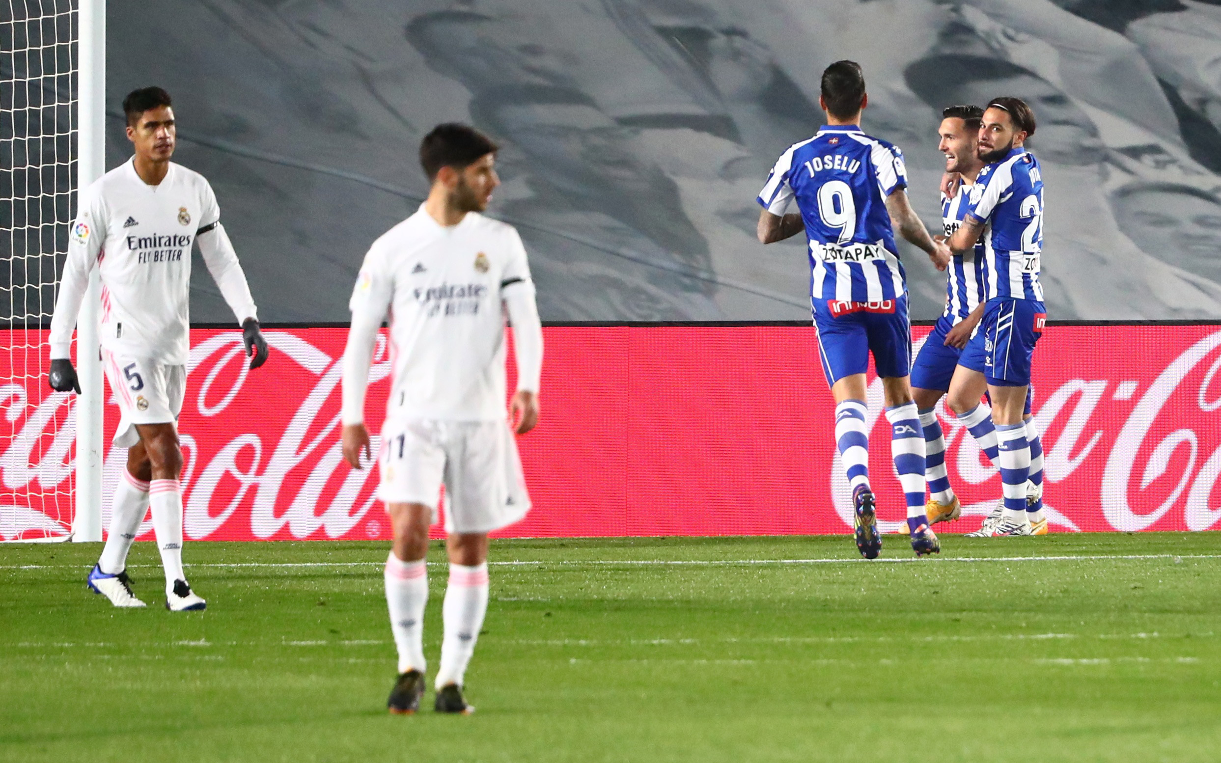 Soccer Football - La Liga Santander - Real Madrid v Deportivo Alaves - Estadio Alfredo Di Stefano, Madrid, Spain - November 28, 2020 Deportivo Alaves' Lucas Perez celebrates scoring their first goal with teammates REUTERS