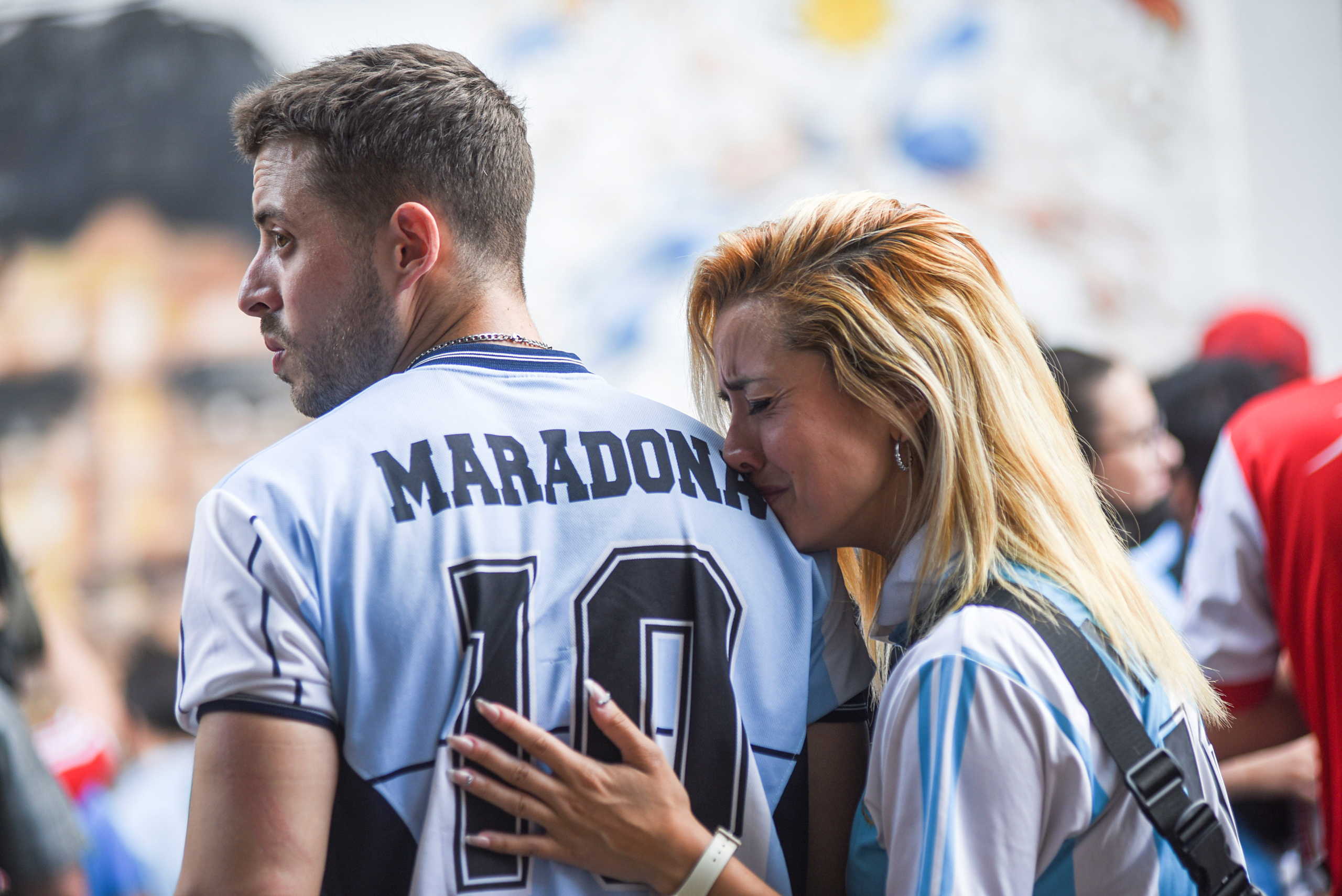 People gather to mourn the death of soccer legend Diego Maradona, outside the Diego Armando Maradona stadium, in Buenos Aires, Argentina November 25, 2020.  REUTERS
