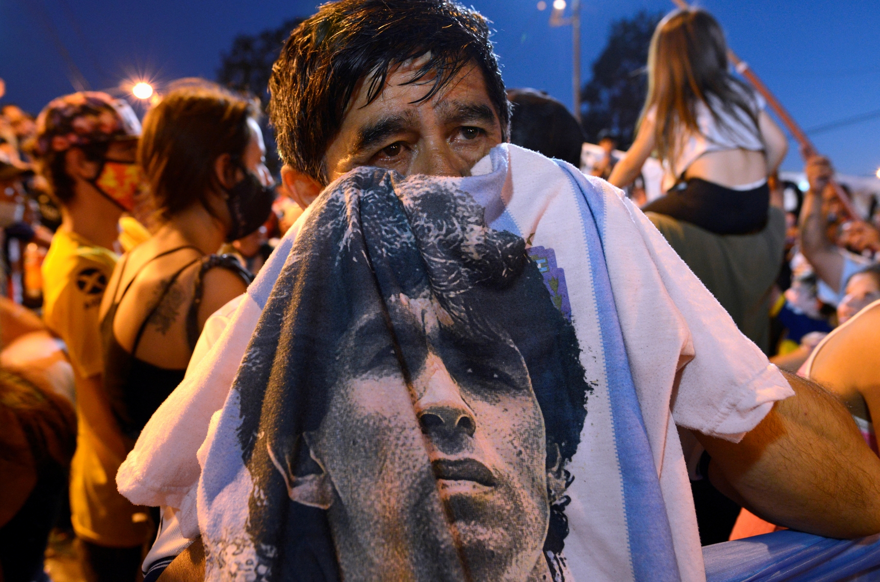 People mourn soccer legend Diego Maradona outside the morgue where his body is being held, in Buenos Aires, Argentina November 25, 2020.  REUTERS