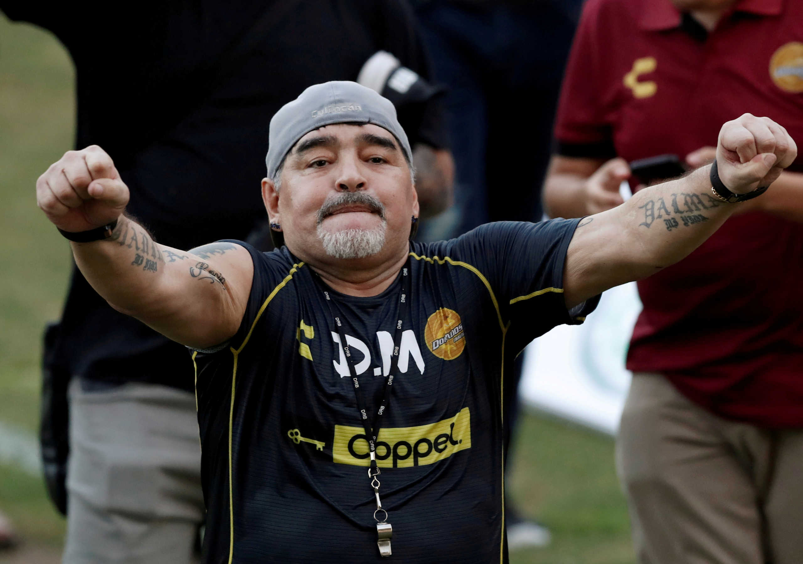 FILE PHOTO: Argentinian soccer legend Diego Armando Maradona reacts to fans during his first training session as coach of Dorados at the Banorte stadium in Culiacan, in the Mexican state of Sinaloa, Mexico September 10, 2018. REUTERS