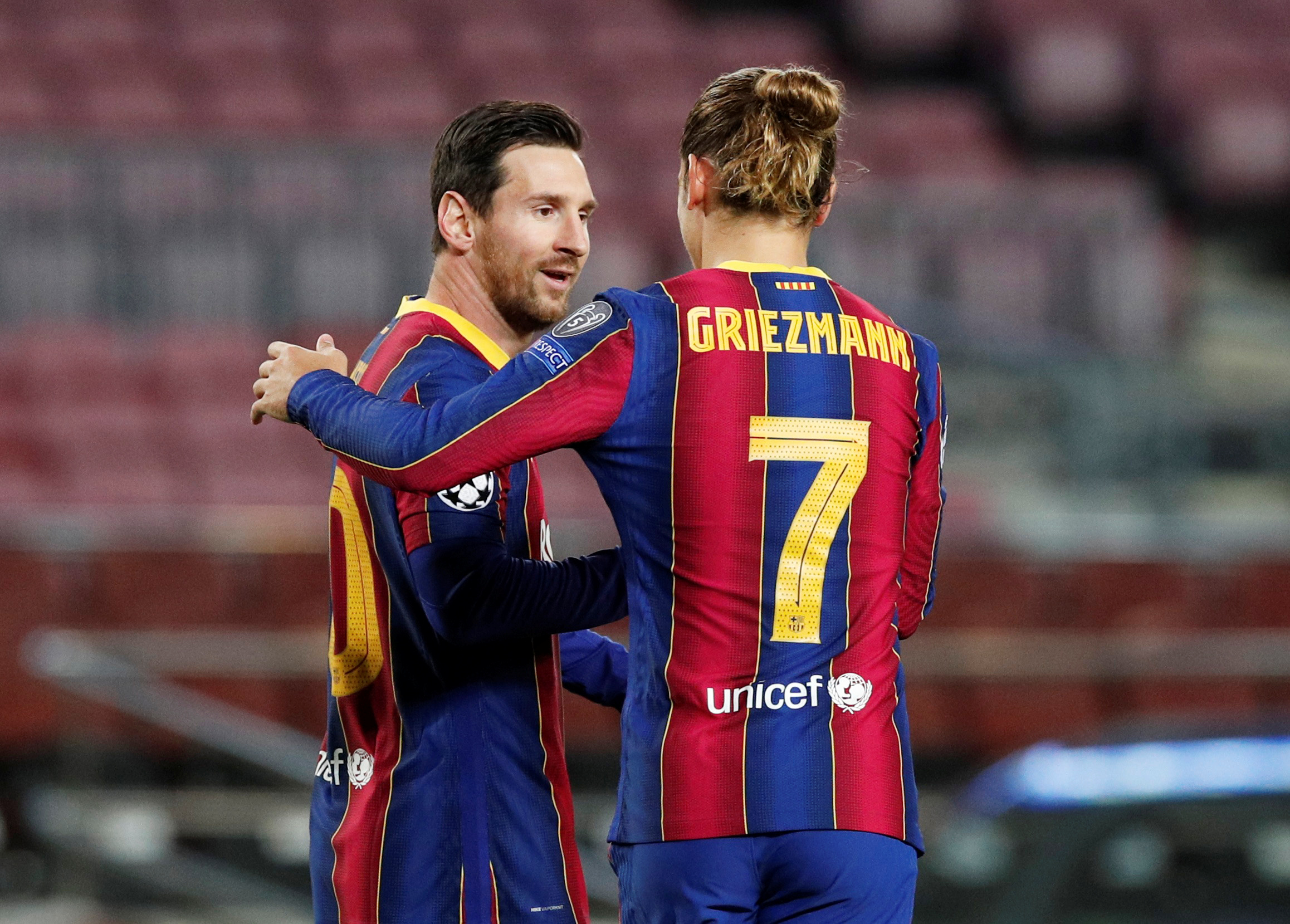 FILE PHOTO: Soccer Football - Champions League - Group G - FC Barcelona v Dynamo Kyiv - Camp Nou, Barcelona, Spain - November 4, 2020 FC Barcelona's Lionel Messi celebrates scoring their first goal with Antoine Griezmann REUTERS