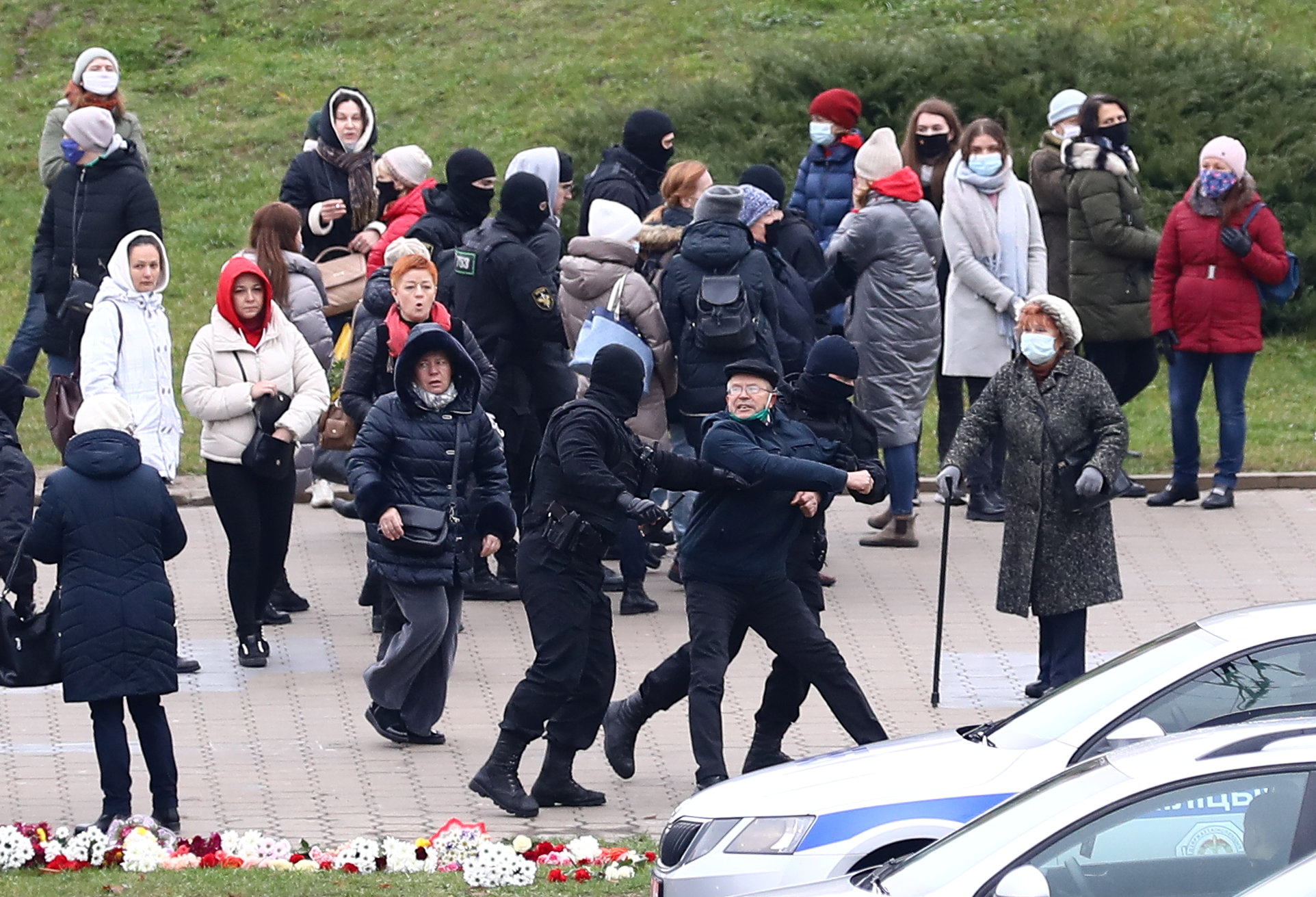 A man reacts as he is taken away by Belarusian law enforcement officers during a rally to reject the presidential election results in Minsk, Belarus November 15, 2020. REUTERS