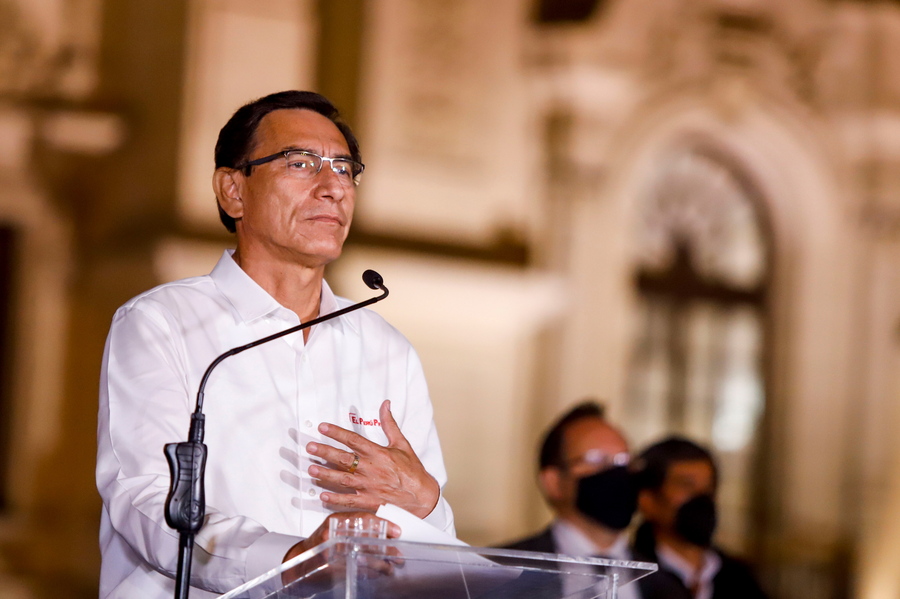 epa08810582 A handout photo made available by the Presidency of Peru shows Head of State of Peru, Martin Vizcarra, while he publicly announces that he accepts the decision of Congress and will leave the Government Palace in Lima, Peru, 09 November 2020. Vizcarra accepted the decision of Congress that dismissed him from the head of state for 'moral incapacity' and announced that he will immediately leave the Government Palace.  EPA