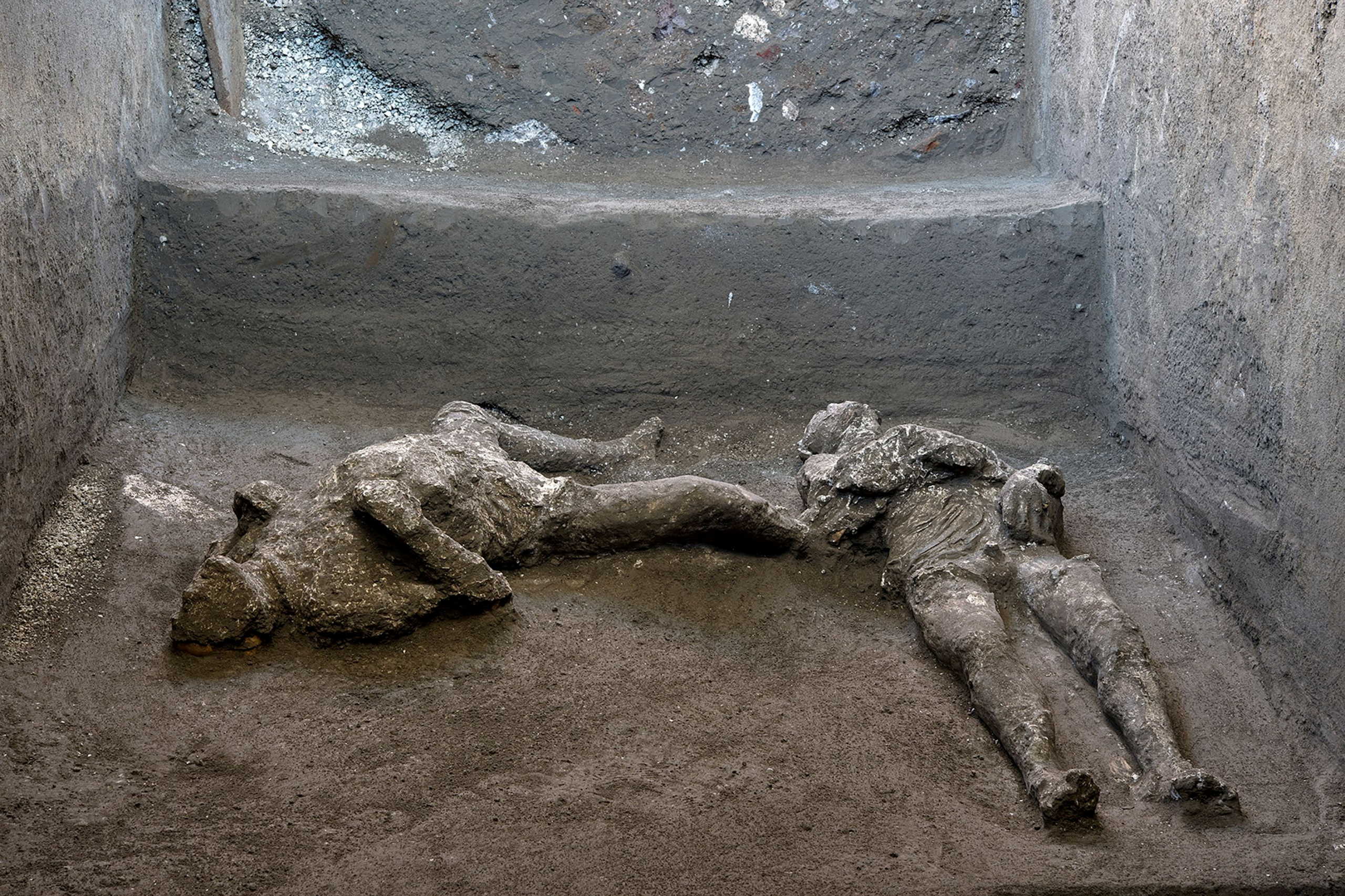 Remains of two men who died in the volcanic eruption that destroyed the ancient Roman city of Pompeii in 79 AD are discovered in a dig carried out during the coronavirus disease (COVID-19) pandemic in Pompeii, Italy November 18, 2020. Picture taken November 18, 2020. Luigi Spina