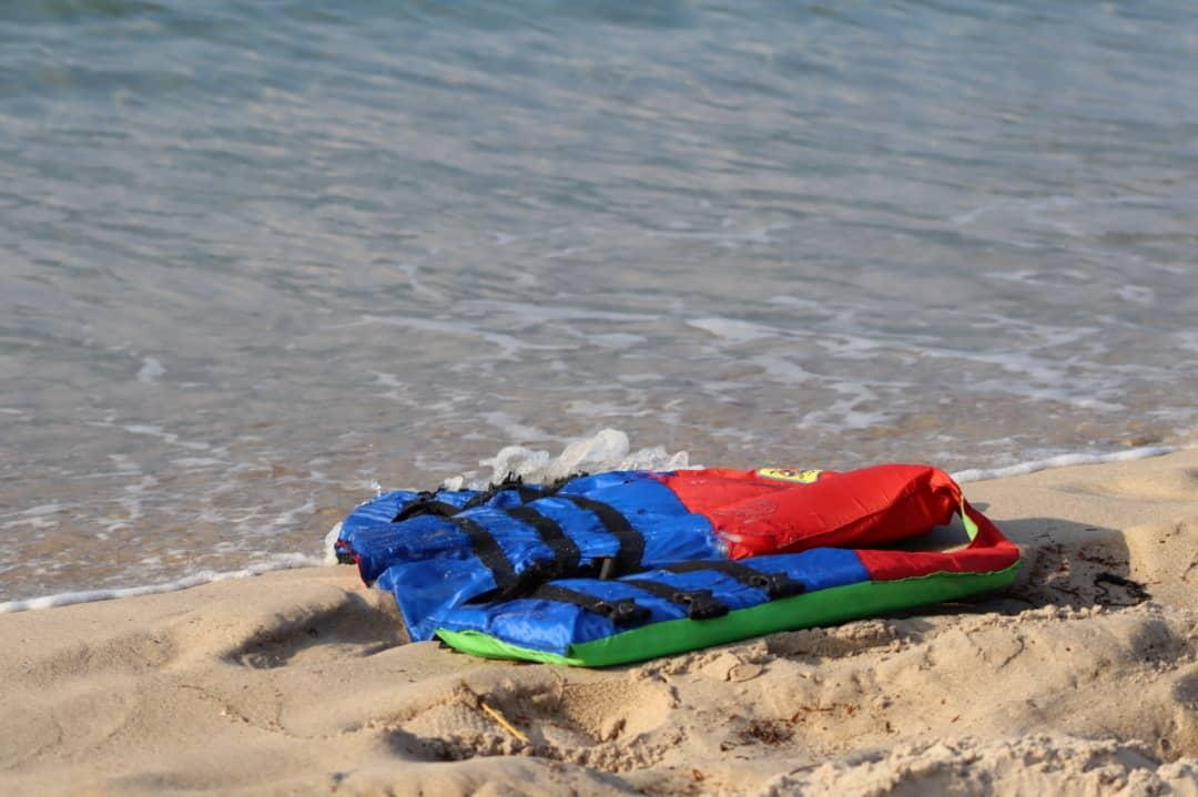 A handout image shows a life jacket on the beach in Khums, Libya November 12, 2020.   IOM 2020