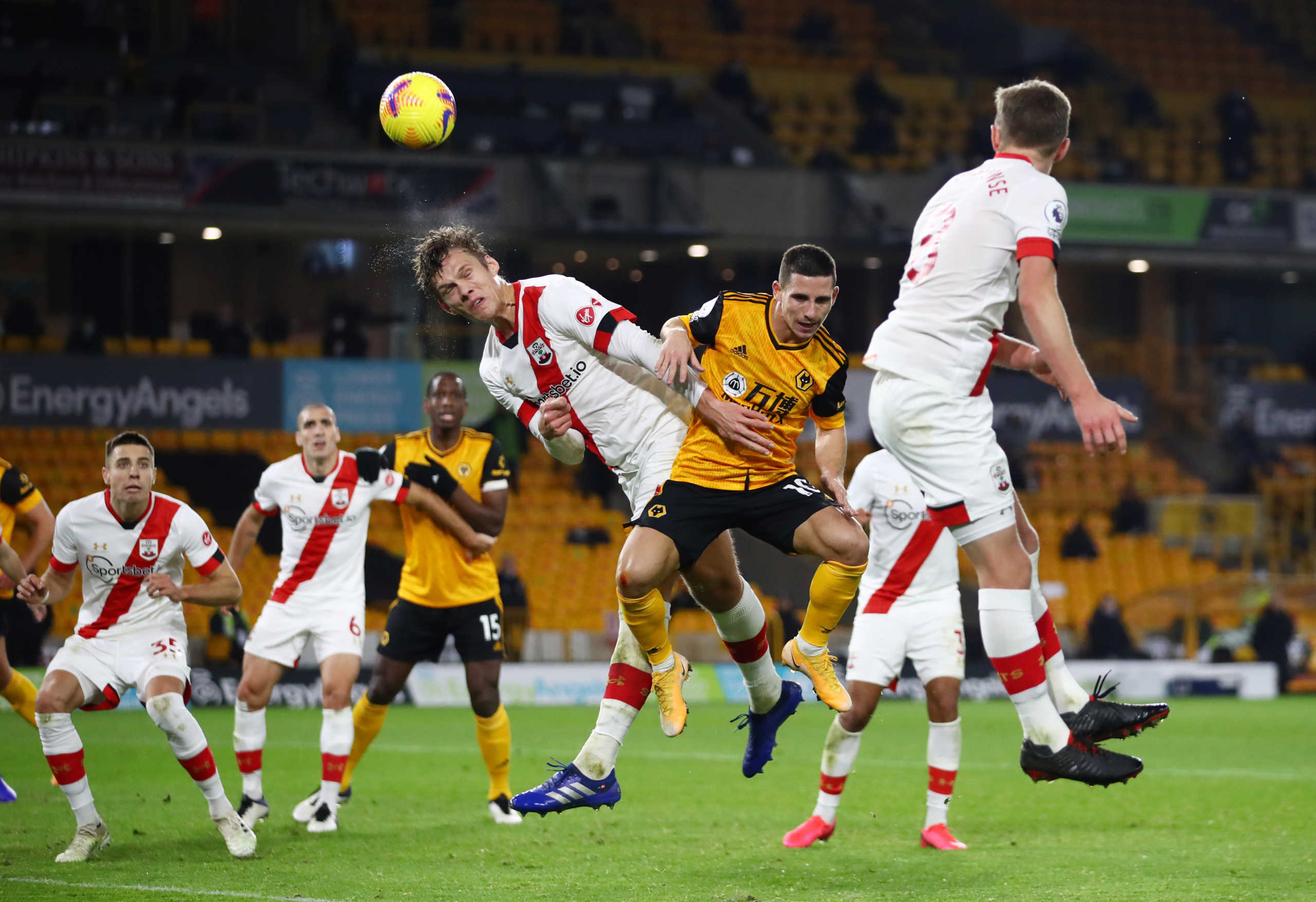 Soccer Football - Premier League - Wolverhampton Wanderers v Southampton - Molineux Stadium, Wolverhampton, Britain - November 23, 2020 Southampton's Jannik Vestergaard in action with Wolverhampton Wanderers' Daniel Podence Pool via REUTERS