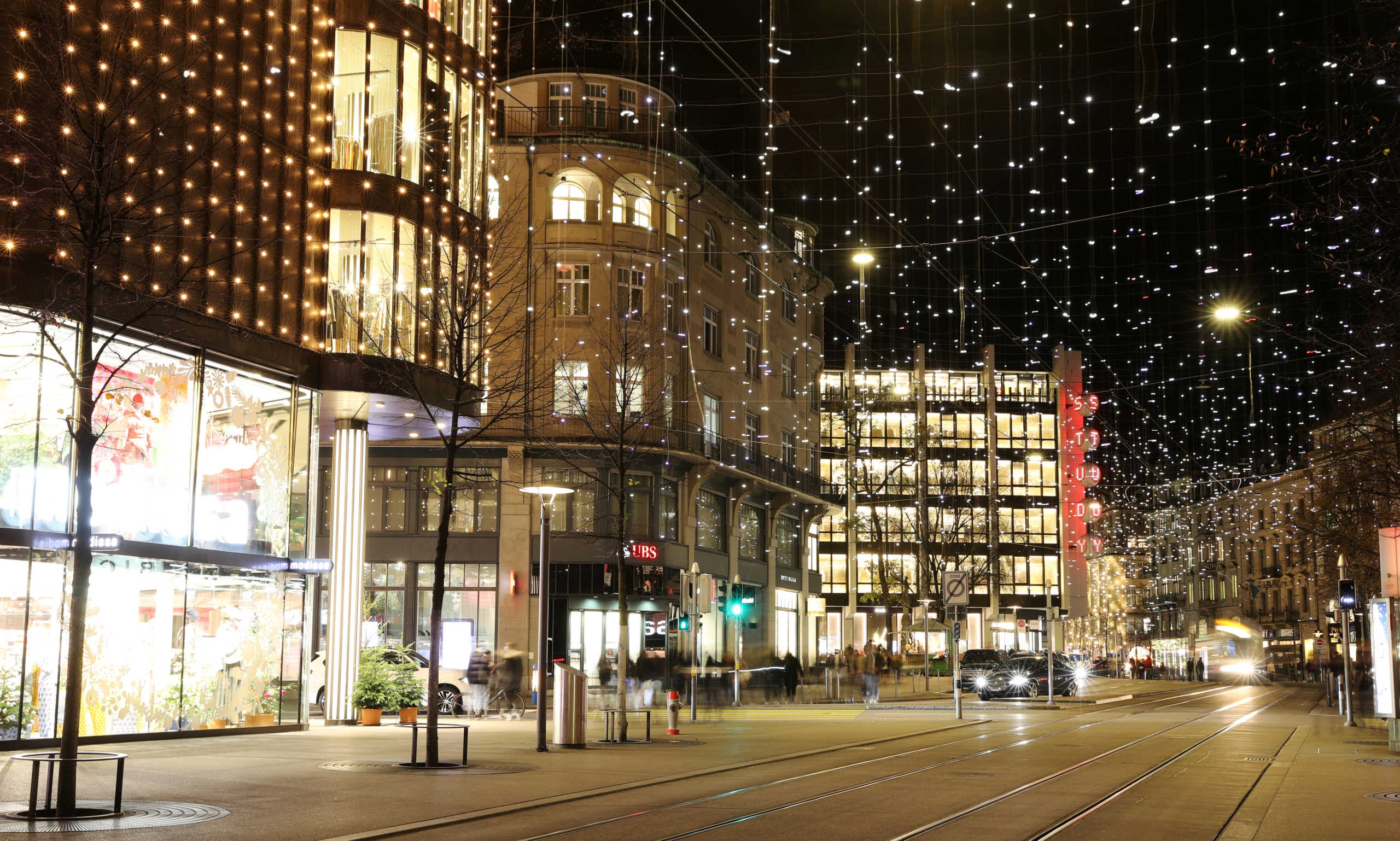 FILE PHOTO: Christmas decorations light up the Bahnhofstrasse shopping street during the continuing coronavirus outbreak in the city centre of Zurich, Switzerland, November 20, 2020. REUTERS