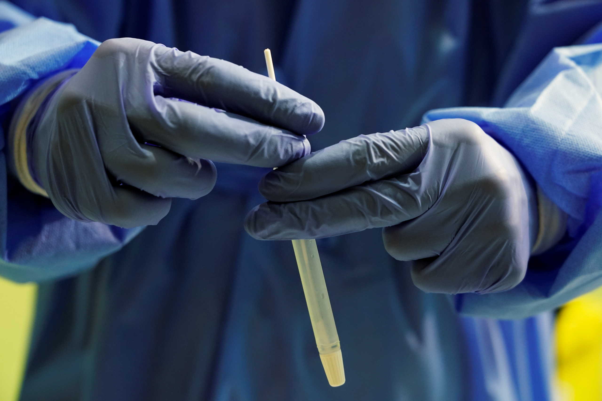 A healthcare worker performs a rapid COVID-19 antigen test amid the coronavirus disease (COVID-19) outbreak in Alpedrete, Spain, November 16, 2020. REUTERS
