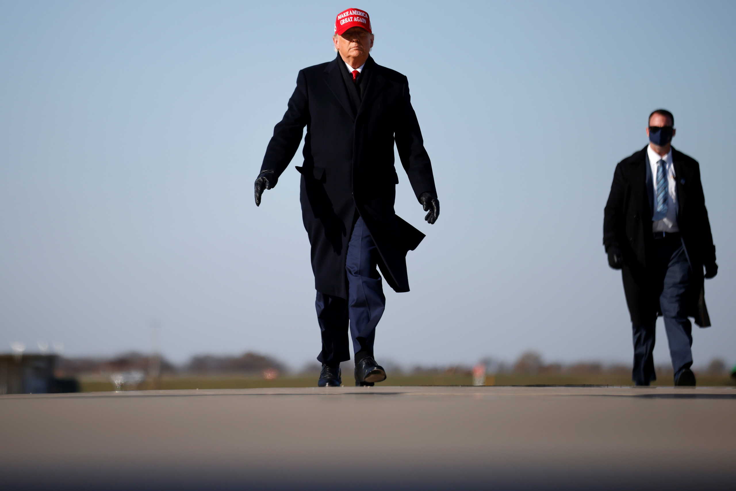 U.S. President Donald Trump arrives for a campaign rally at Dubuque Regional Airport in Dubuque, Iowa, U.S., November 1, 2020. REUTERS