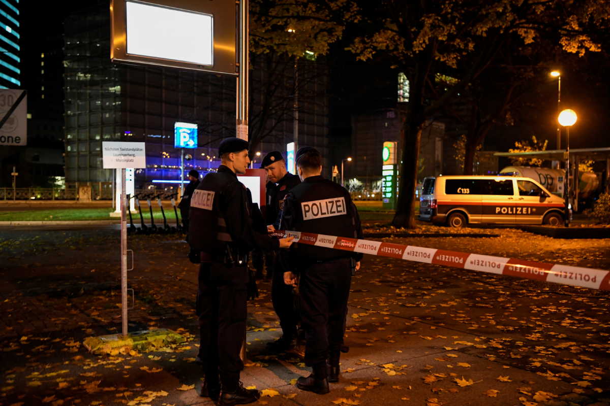 Police officers secure an area after exchanges of gunfire in Vienna, Austria November 3, 2020. REUTERS