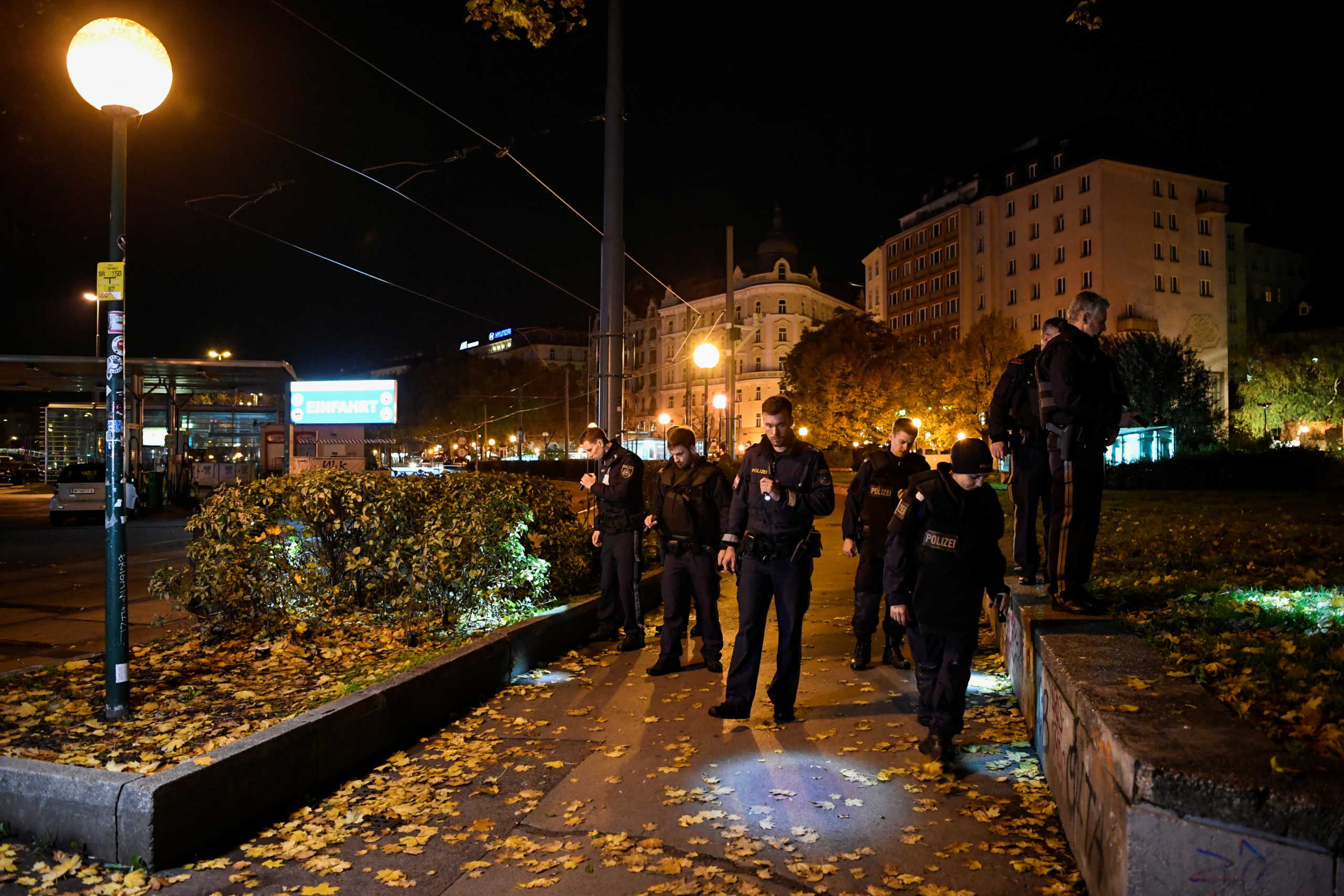 Police officers search in an area after exchanges of gunfire in Vienna, Austria November 3, 2020. REUTERS