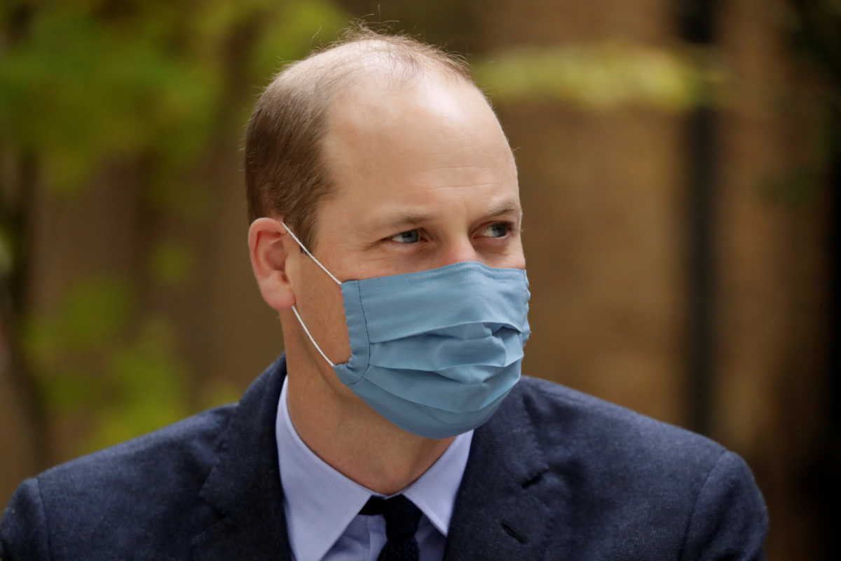 FILE PHOTO: Britain's Prince William wears a protective mask as he visits St. Bartholomew's Hospital in London, Britain October 20, 2020. Matt Dunham