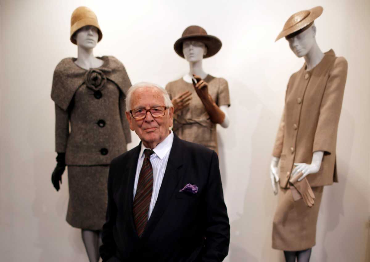 FILE PHOTO: French fashion designer Pierre Cardin poses in front of his 1954-1956-1957 fashion creations in his museum called "Past-Present-Future" in Paris November 12, 2014. REUTERS