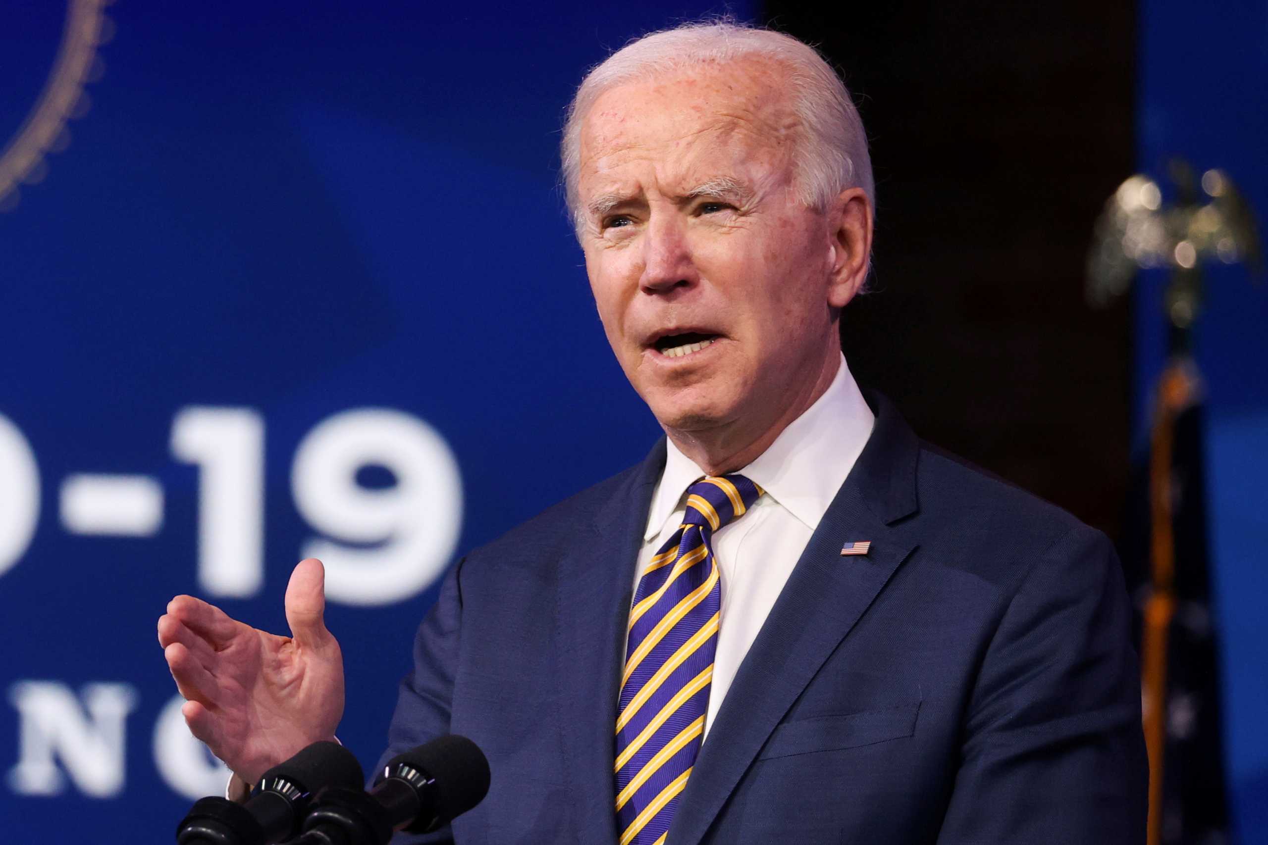 FILE PHOTO: U.S. President-elect Joe Biden delivers remarks on the U.S. response to the coronavirus disease (COVID-19) outbreak, at his transition headquarters in Wilmington, Delaware, U.S., December 29, 2020. REUTERS