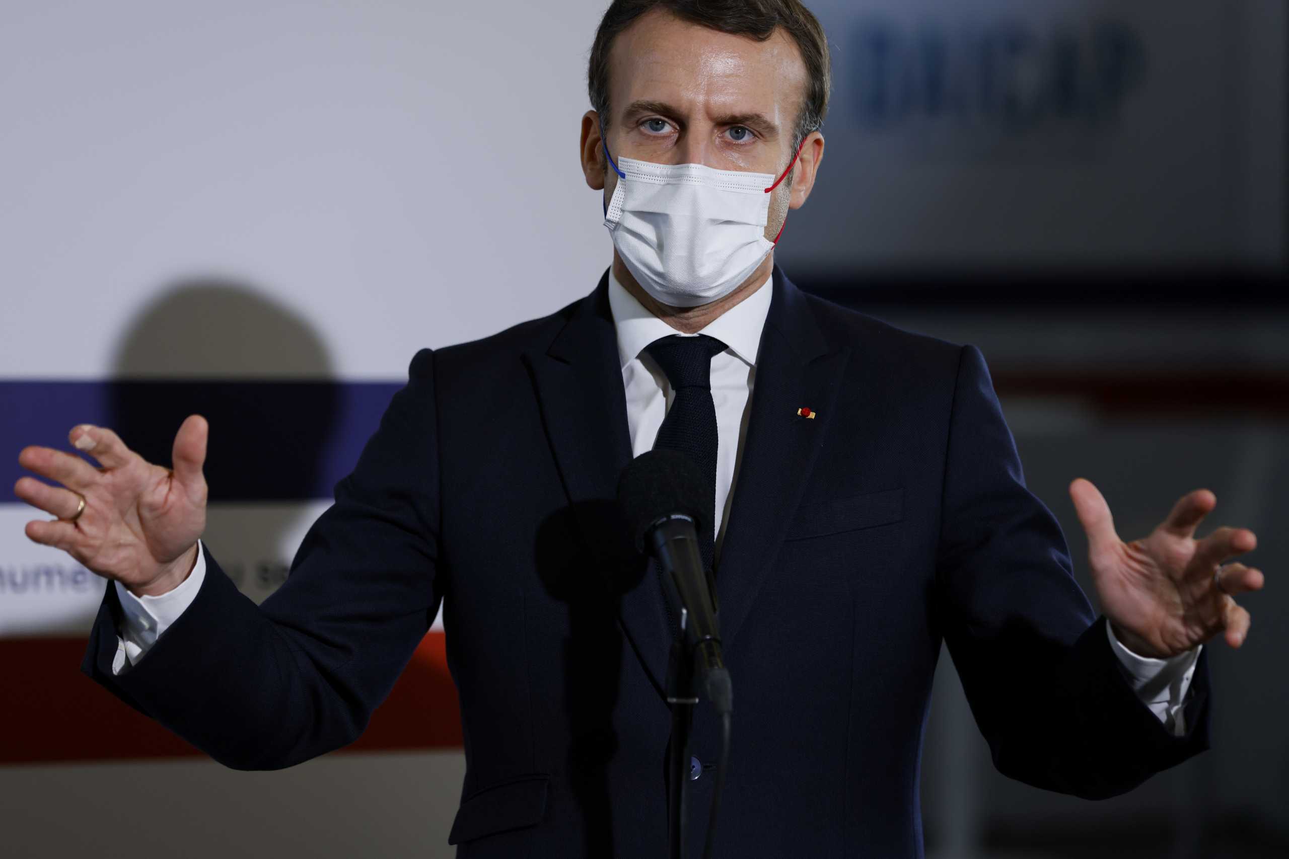 French President Emmanuel Macron gestures as he gives a speech on health research at the Necker Hospital in Paris, France December 4, 2020. Thomas Samson