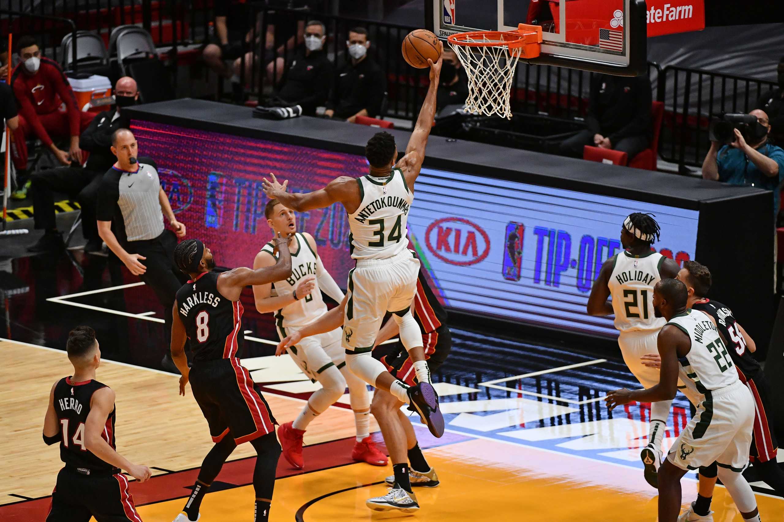 Dec 29, 2020; Miami, Florida, USA; Milwaukee Bucks forward Giannis Antetokounmpo (34) attempts to shoot the ball against the Miami Heat during the first half at American Airlines Arena. Mandatory Credit: Jasen Vinlove-USA TODAY Sports