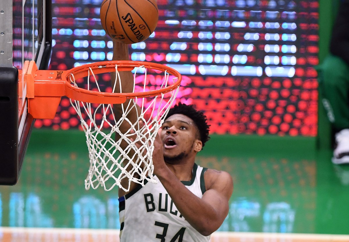Dec 23, 2020; Boston, Massachusetts, USA; Milwaukee Bucks forward Giannis Antetokounmpo (34) attempts a basket against the Boston Celtics during the first half at the TD Garden. Mandatory Credit: Brian Fluharty-USA TODAY Sports