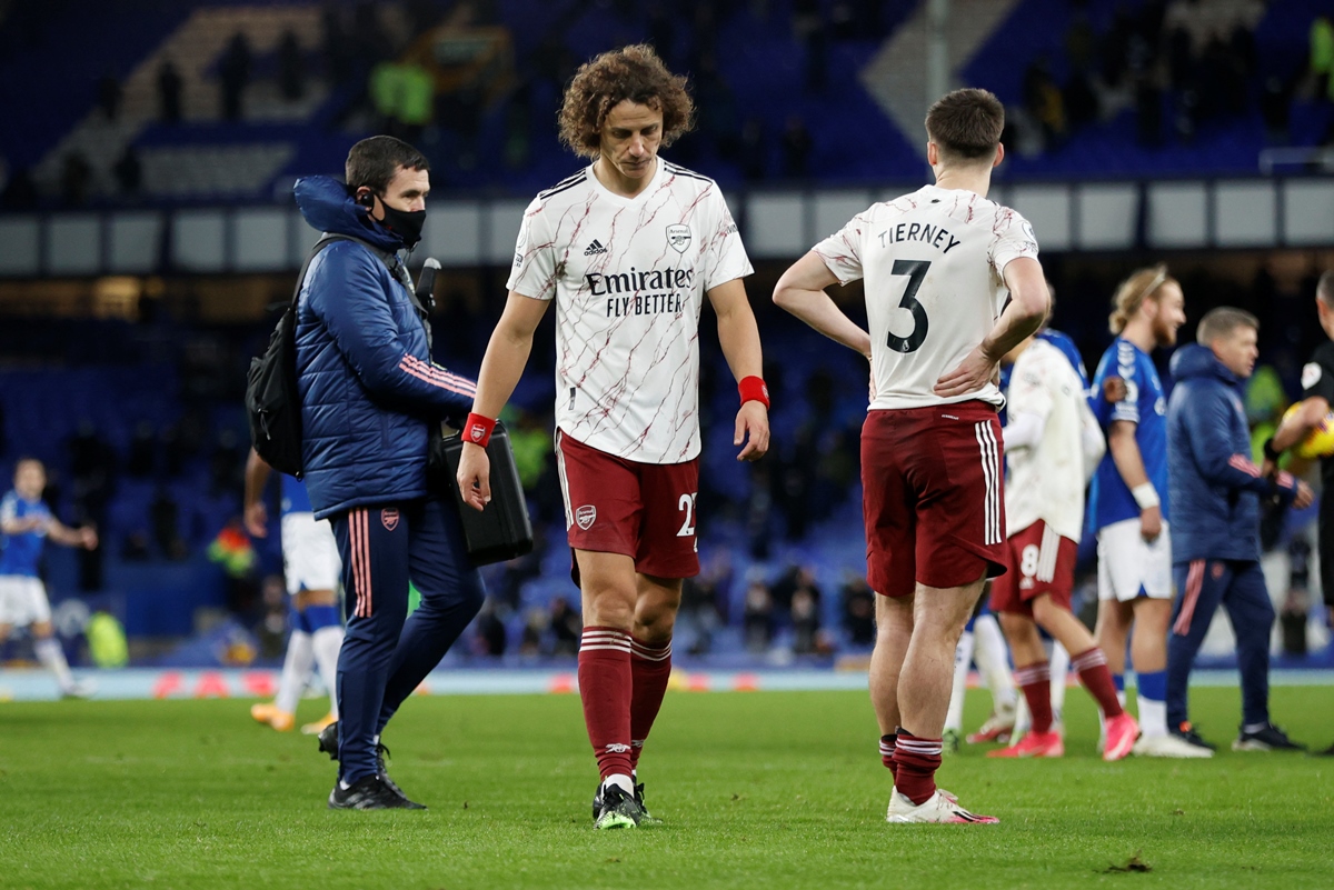 Soccer Football - Premier League - Everton v Arsenal - Goodison Park, Liverpool, Britain - December 19, 2020 Arsenal's David Luiz looks dejected after the match Pool via REUTERS