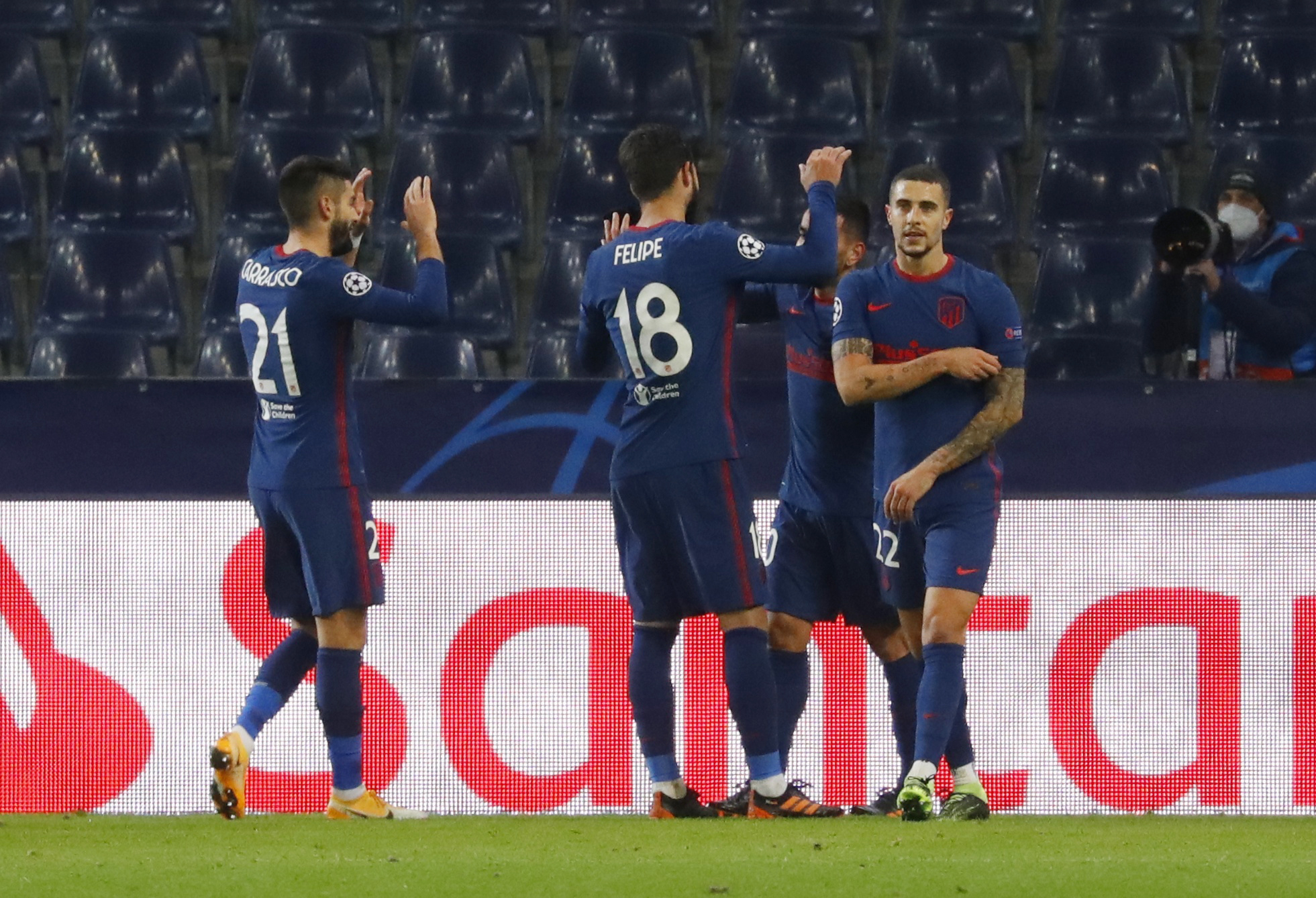 Soccer Football - Champions League - Group A - FC Salzburg v Atletico Madrid - Red Bull Arena Salzburg, Salzburg, Austria - December 9, 2020   Atletico Madrid's Yannick Carrasco celebrates scoring their second goal with teammates REUTERS