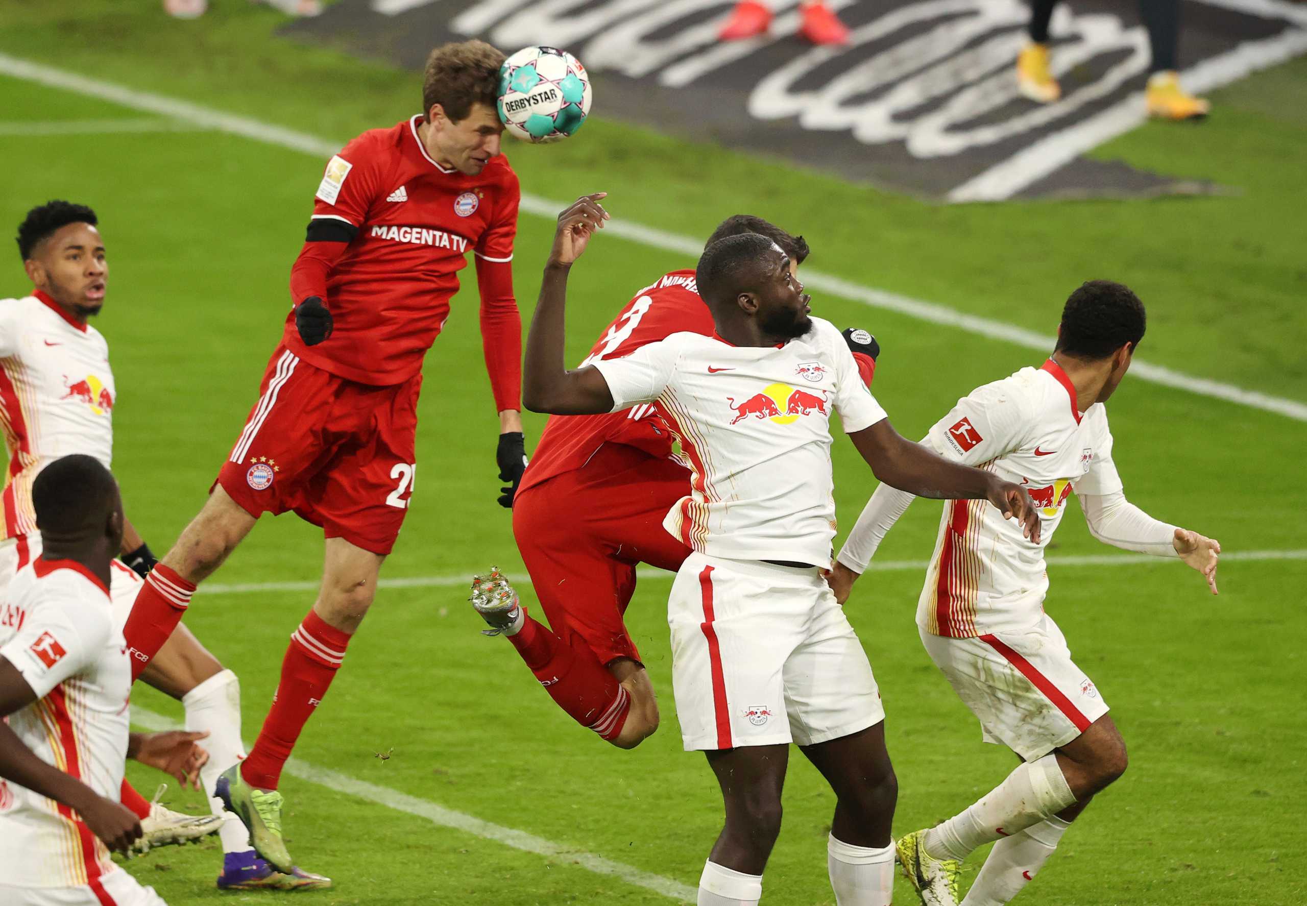 Soccer Football - Bundesliga - Bayern Munich v RB Leipzig - Allianz Arena, Munich, Germany - December 5, 2020 Bayern Munich's Thomas Muller scores their third goal Pool via REUTERS