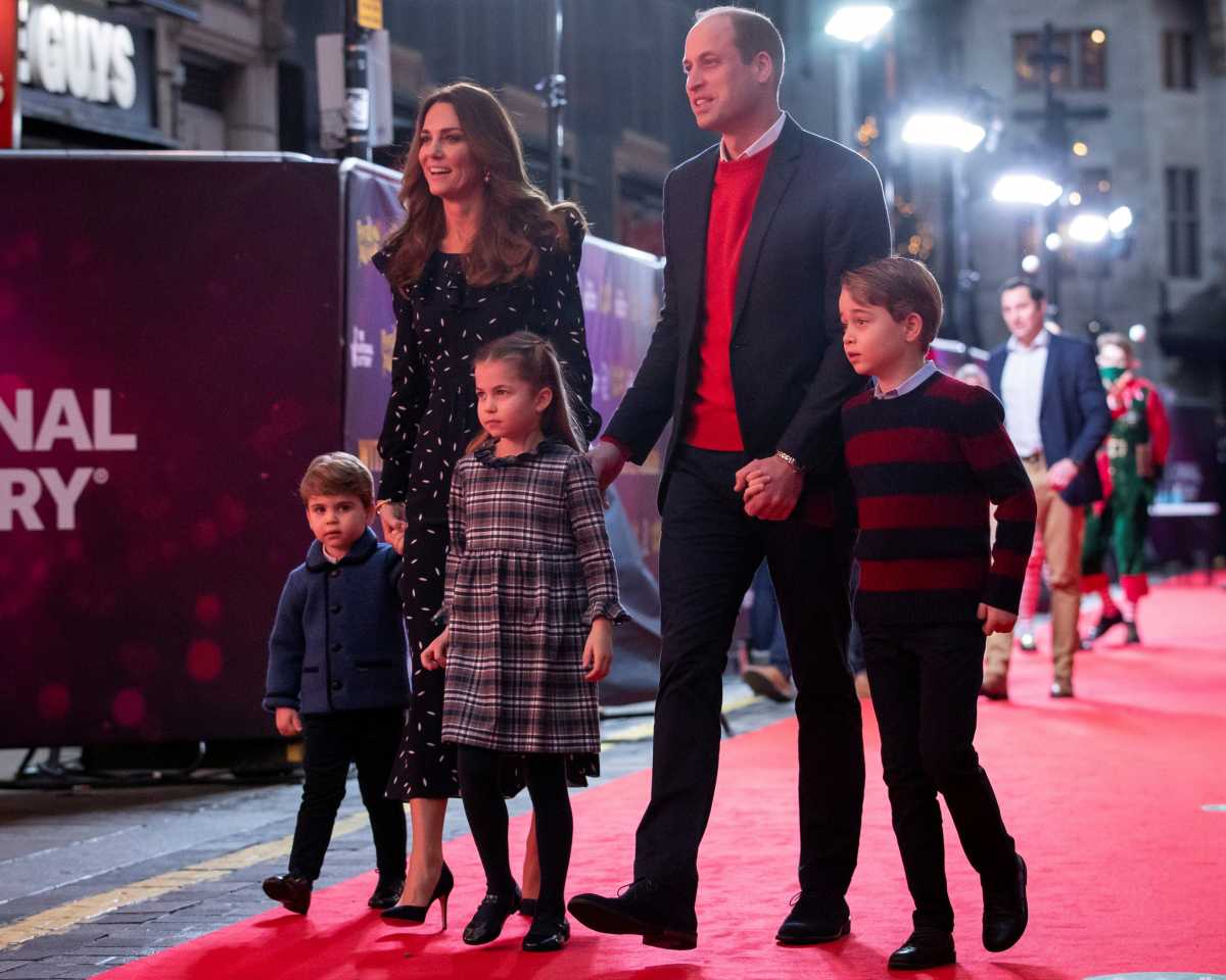 Britain's Prince William, Catherine, Duchess of Cambridge and their children, Prince Louis, Princess Charlotte and Prince George attend a special pantomime performance hosted by The National Lottery, to thank key workers and their families for their efforts throughout the COVID-19 pandemic at London's Palladium Theatre, London, Britain December 11, 2020. Aaron Chown
