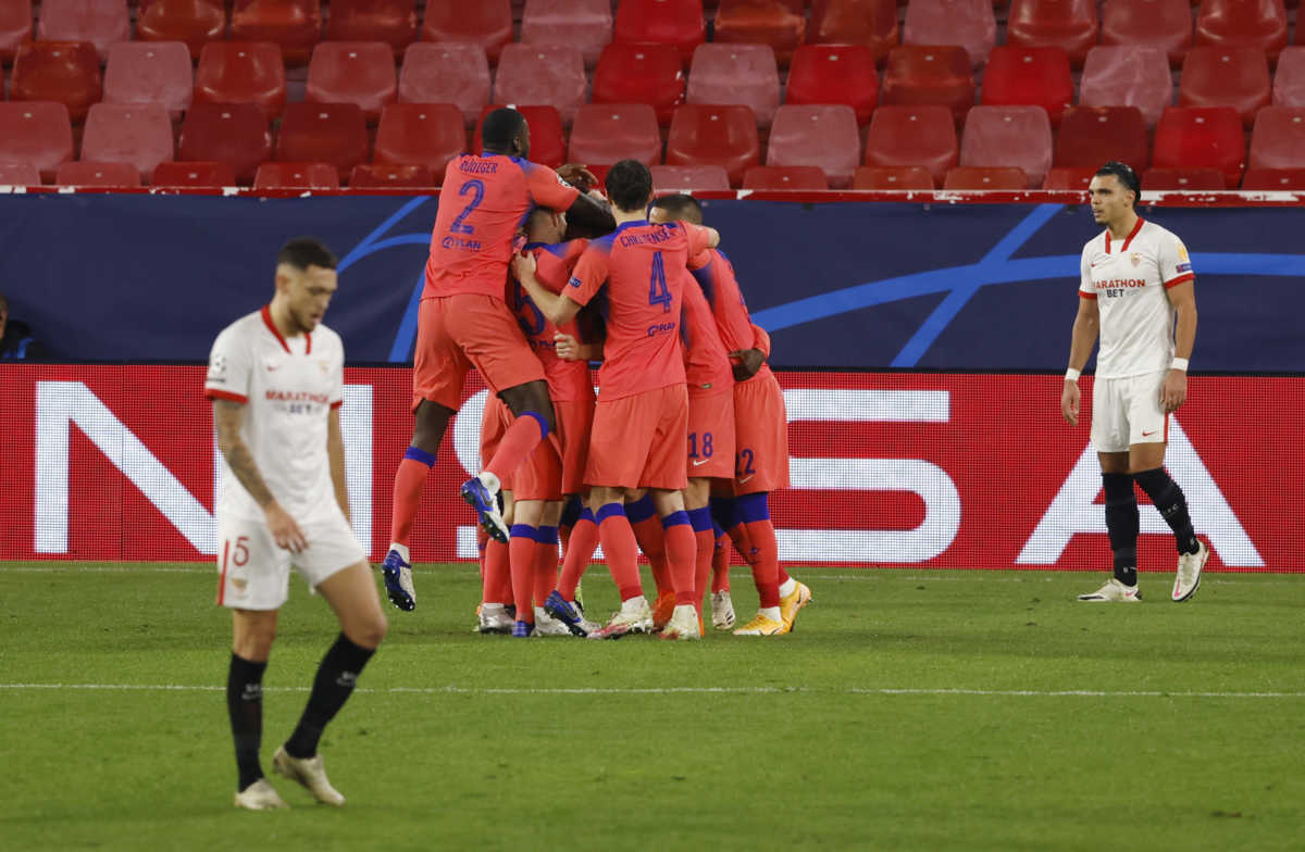 Soccer Football - Champions League - Group E - Sevilla v Chelsea - Ramon Sanchez Pizjuan, Seville, Spain - December 2, 2020  Chelsea's Olivier Giroud celebrates scoring their third goal with teammates REUTERS