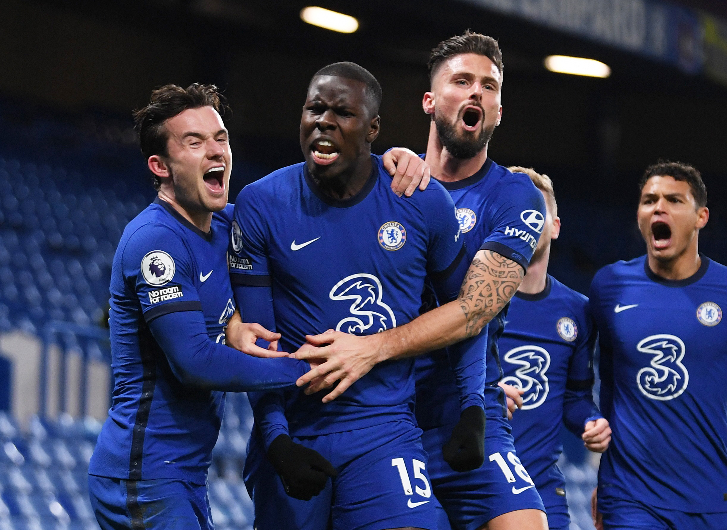 Soccer Football - Premier League - Chelsea v Leeds United - Stamford Bridge, London, Britain - December 5, 2020 Chelsea's Kurt Zouma celebrates scoring their second goal with Olivier Giroud and Ben Chilwell Pool via REUTERS