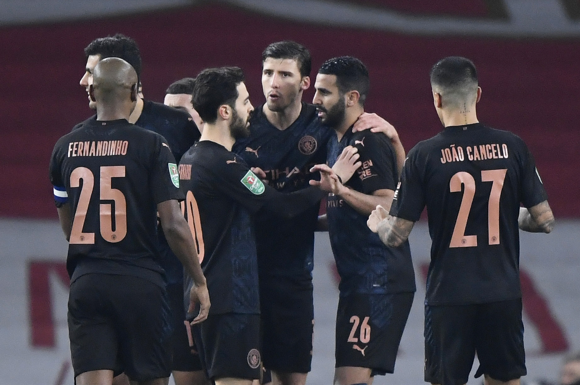 Soccer Football - Carabao Cup - Quarter-Final - Arsenal v Manchester City - Emirates Stadium, London, Britain - December 22, 2020 Manchester City's Riyad Mahrez celebrates scoring their second goal with teammates REUTERS