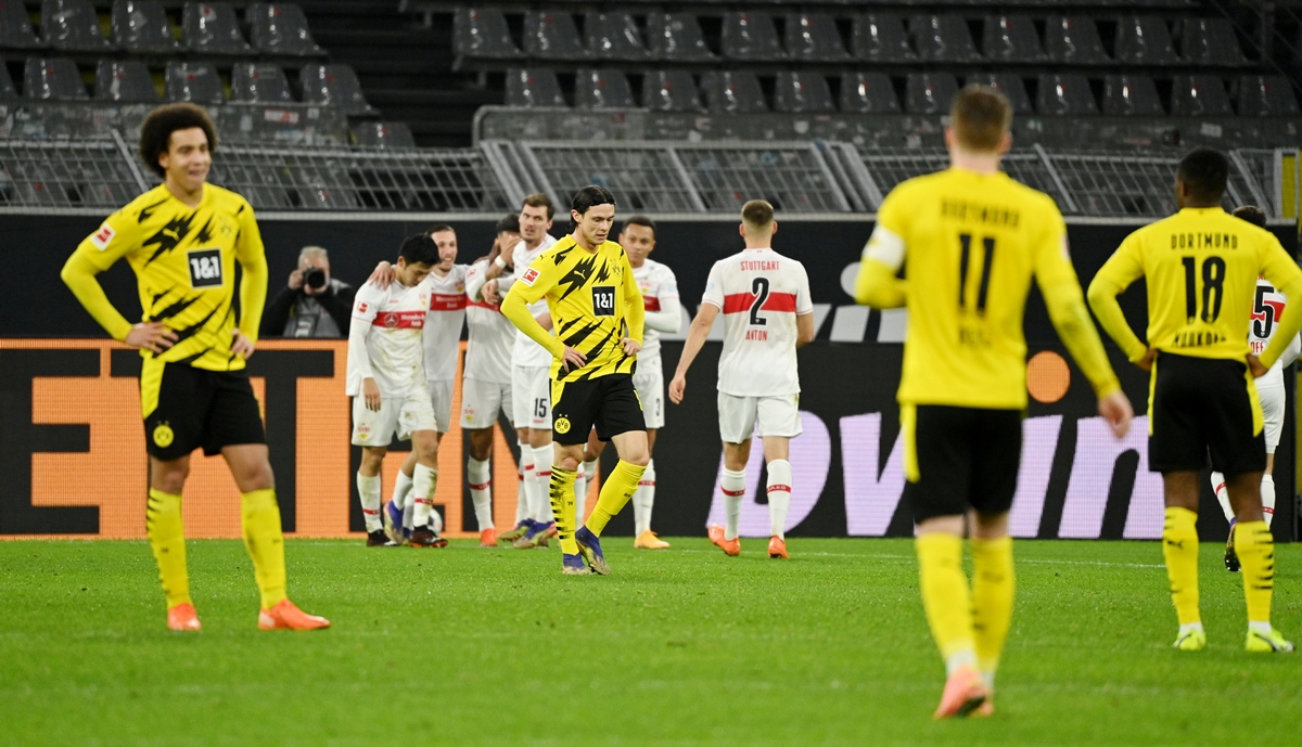 Soccer Football - Bundesliga - Borussia Dortmund v VfB Stuttgart - Signal Iduna Park, Dortmund, Germany - December 12, 2020  Borussia Dortmund's Nico Schulz looks dejected after VfB Stuttgart's Nicolas Gonzalez scores their fifth goal Pool via REUTERS