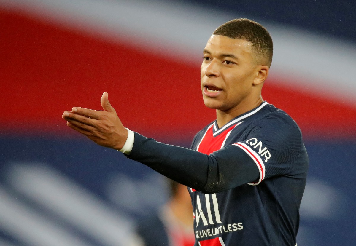 Soccer Football - Ligue 1 - Paris St Germain v Olympique Lyonnais - Parc des Princes, Paris, France - December 13, 2020 Paris St Germain's Kylian Mbappe reacts REUTERS