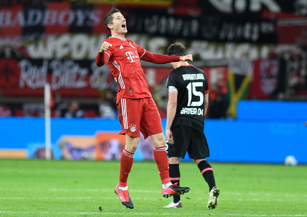 Soccer Football - Bundesliga - Bayer Leverkusen v Bayern Munich - BayArena, Leverkusen, Germany - December 19, 2020 Bayern Munich's Robert Lewandowski celebrates scoring their second goal Pool via REUTERS