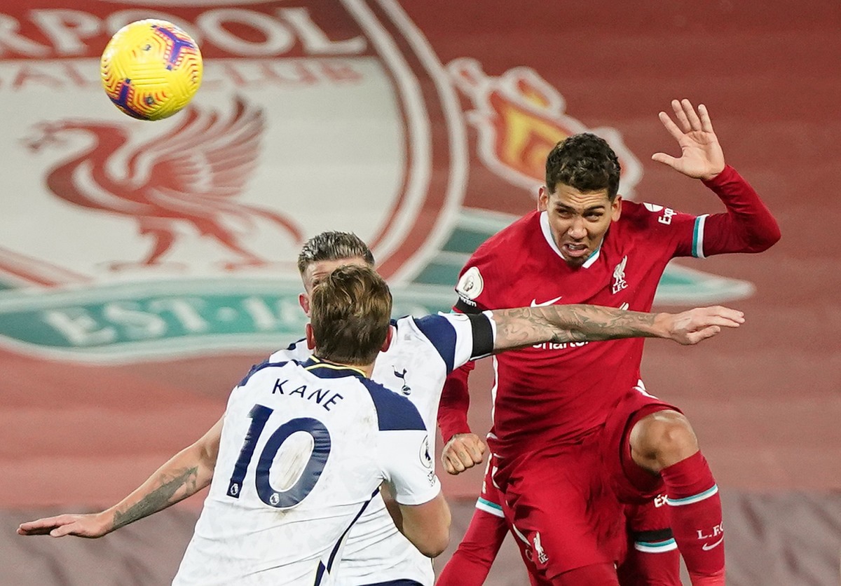 Soccer Football - Premier League - Liverpool v Tottenham Hotspur - Anfield, Liverpool, Britain - December 16, 2020 Liverpool's Roberto Firmino scores their second goal Pool via REUTERS