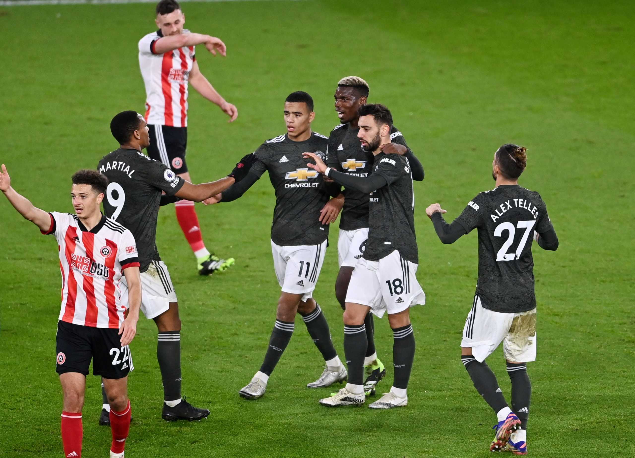 Soccer Football - Premier League - Sheffield United v Manchester United - Bramall Lane, Sheffield, Britain - December 17, 2020 Manchester United's Anthony Martial celebrates scoring their second goal with Mason Greenwood, Paul Pogba and Bruno Fernandes Pool via REUTERS