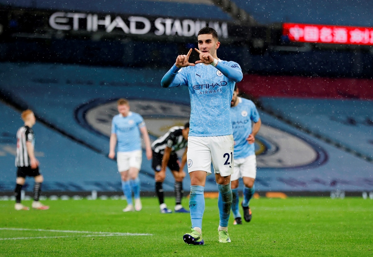 Soccer Football - Premier League - Manchester City v Newcastle United - Etihad Stadium, Manchester, Britain - December 26, 2020 Manchester City's Ferran Torres celebrates scoring their second goal Pool via REUTERS