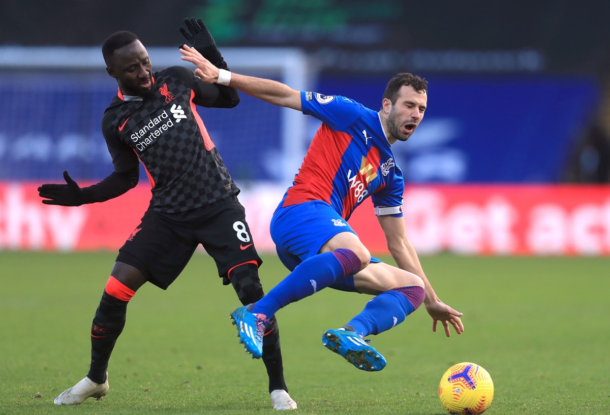 Soccer Football - Premier League - Crystal Palace v Liverpool - Selhurst Park, London, Britain - December 19, 2020 Crystal Palace's Luka Milivojevic in action with Liverpool's Naby Keita Pool via REUTERS