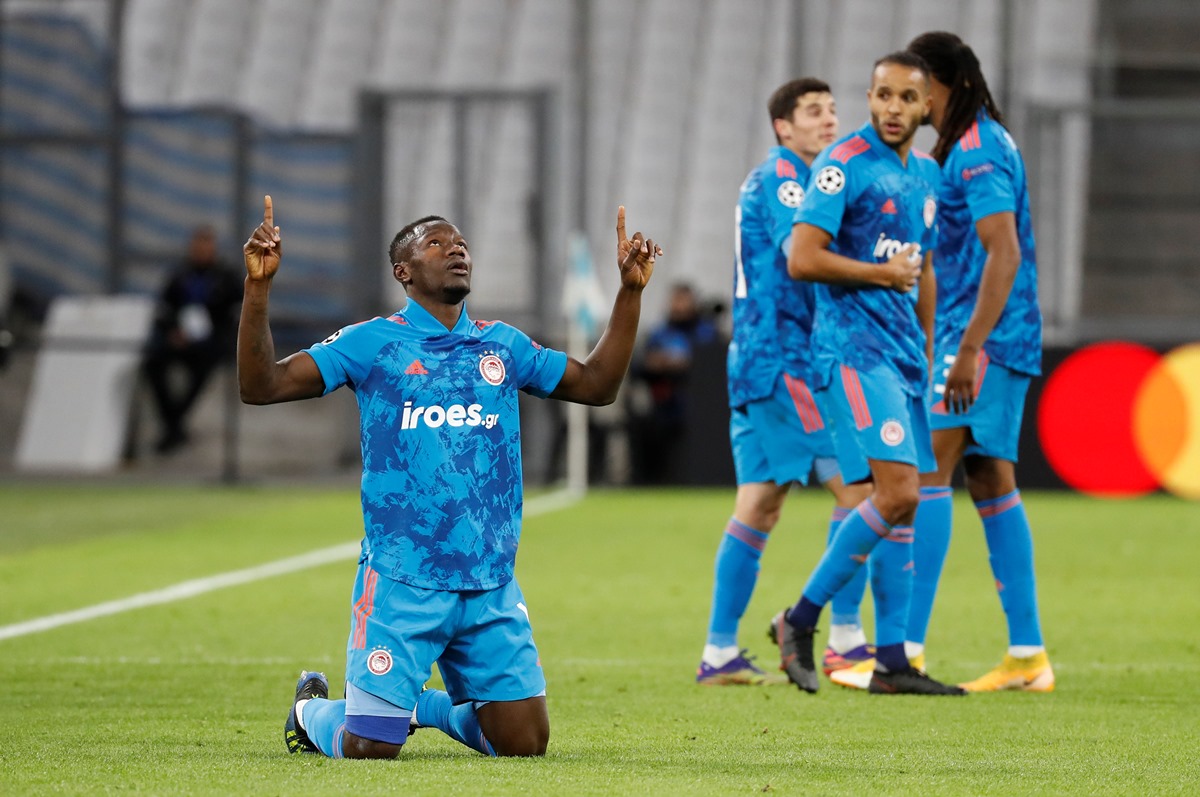 Soccer Football - Champions League - Group C - Olympique de Marseille v Olympiacos - Orange Velodrome, Marseille, France - December 1, 2020  Olympiacos' Mady Camara celebrates scoring their first goal with teammates REUTERS