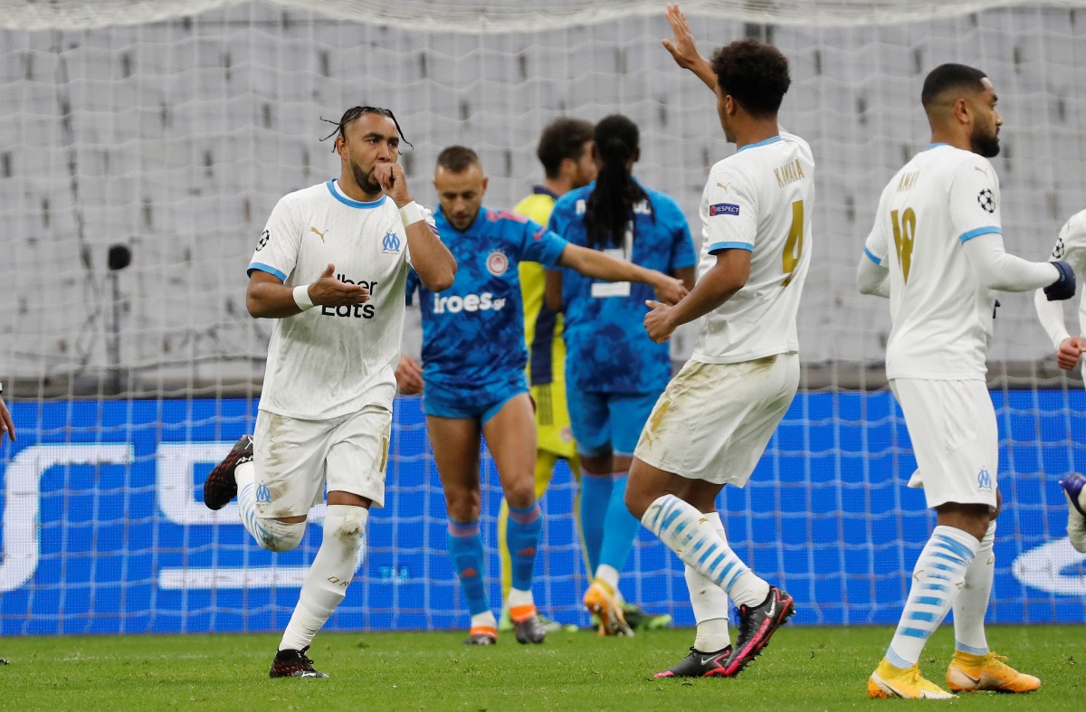 Soccer Football - Champions League - Group C - Olympique de Marseille v Olympiacos - Orange Velodrome, Marseille, France - December 1, 2020  Olympique de Marseille's Dimitri Payet celebrates scoring their first goal with teammates REUTERS