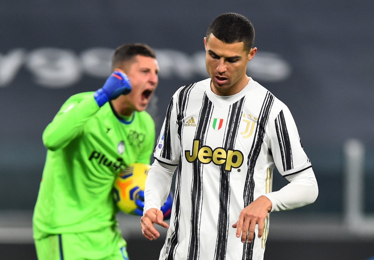 Soccer Football - Serie A - Juventus v Atalanta - Allianz Stadium, Turin, Italy - December 16, 2020 Juventus' Cristiano Ronaldo reacts after missing a penalty REUTERS